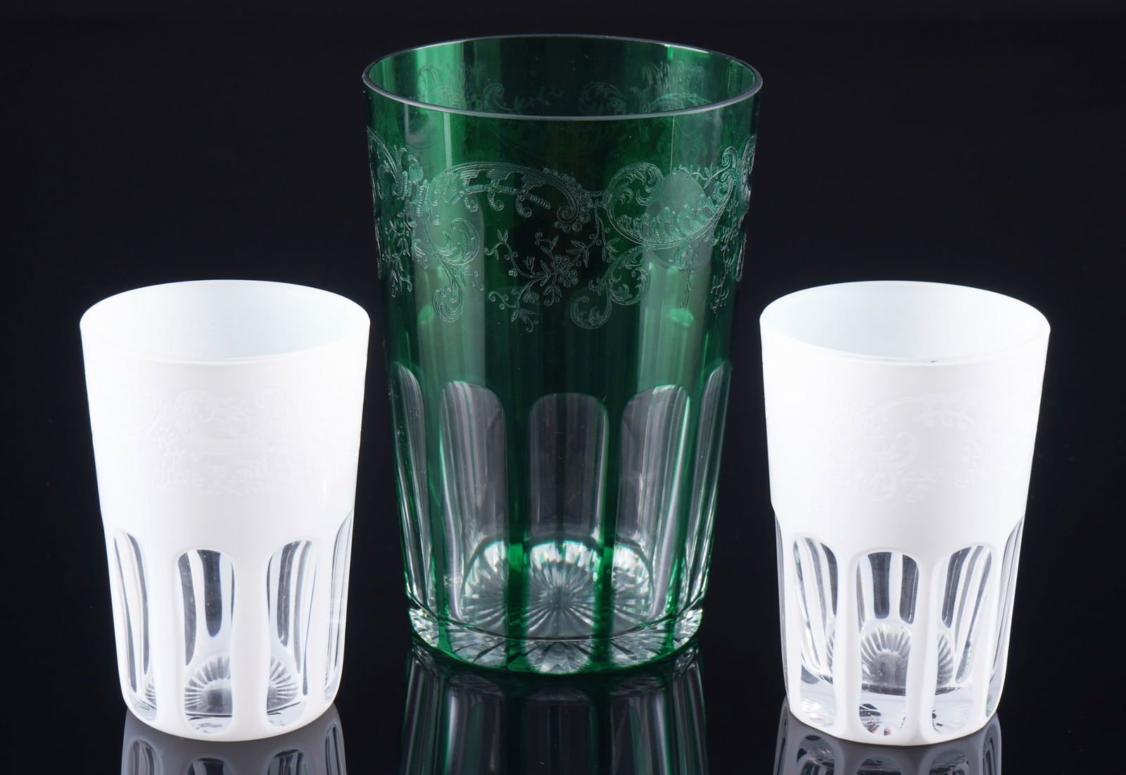 St. Louis highball glass and two white water glasses,: Crystal, France, company sticker, green highball glass H 13.3 cm x D 8.8 cm and two matte white water glasses H 9 cm x D 6 cm