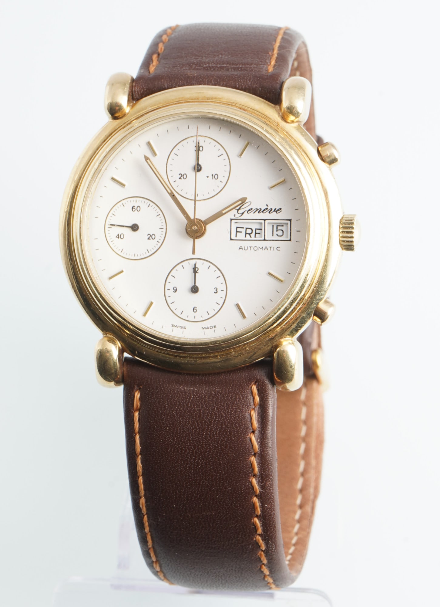 Geneve 585 Gold Automatic Men's Chronograph wristwatch,: 585 yellow gold case, stamped 585 on the back, automatic movement, white dial with "Geneve" inscription, baton indices, three subdials (full chronograph), day and date display at 3 o'clock, H 41.9 mm