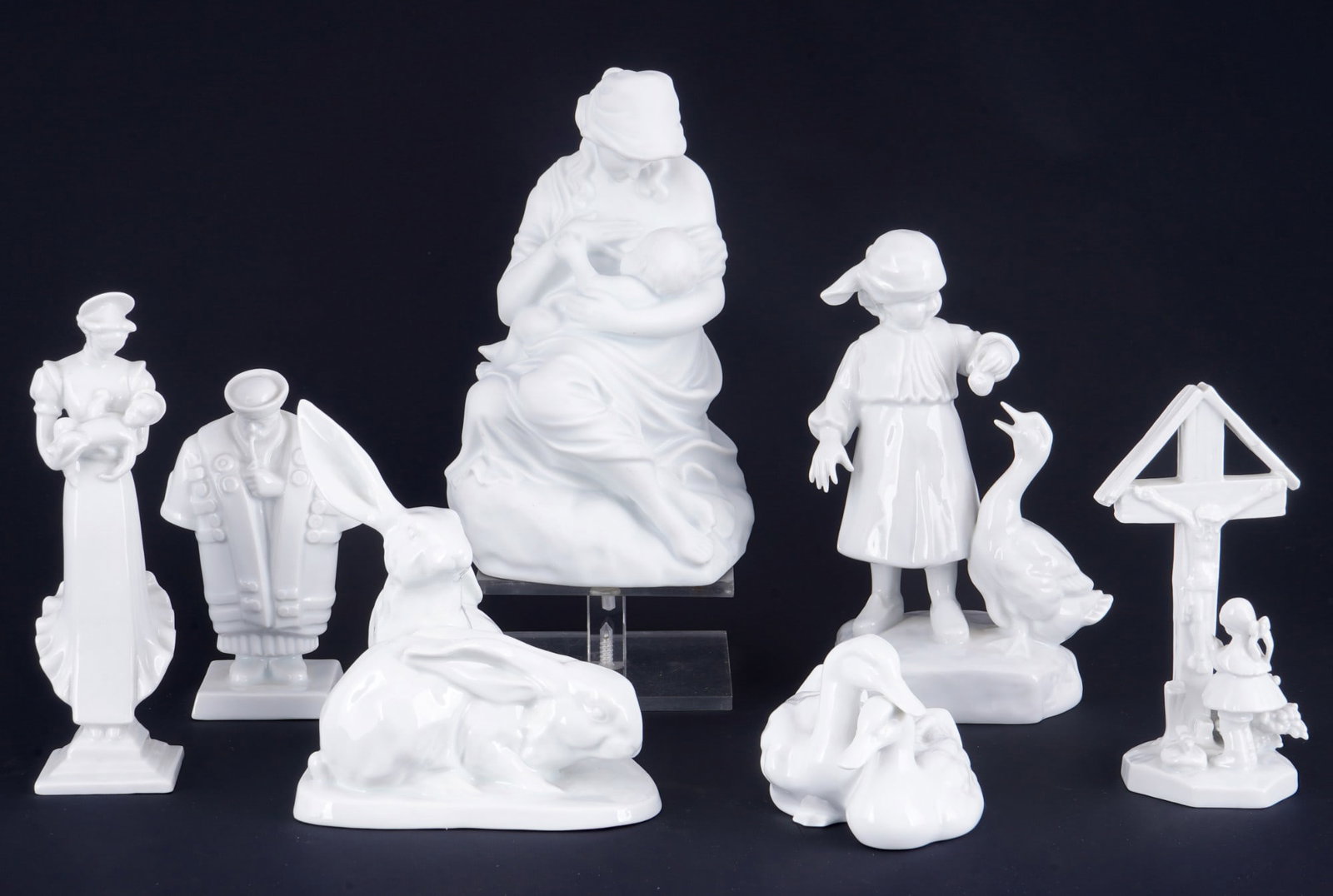 Herend White 7 figures,: porcelain, Hungary 20th century, blue company mark, 1x nursing mother #5420 H19 cm x W 12.5 cm, 1x pair of rabbits #5332 H 14 cm x W 13 cm, 1x goose keeper #5565 H 18.5 cm x W 11 cm, 1x Maty? Madonna 