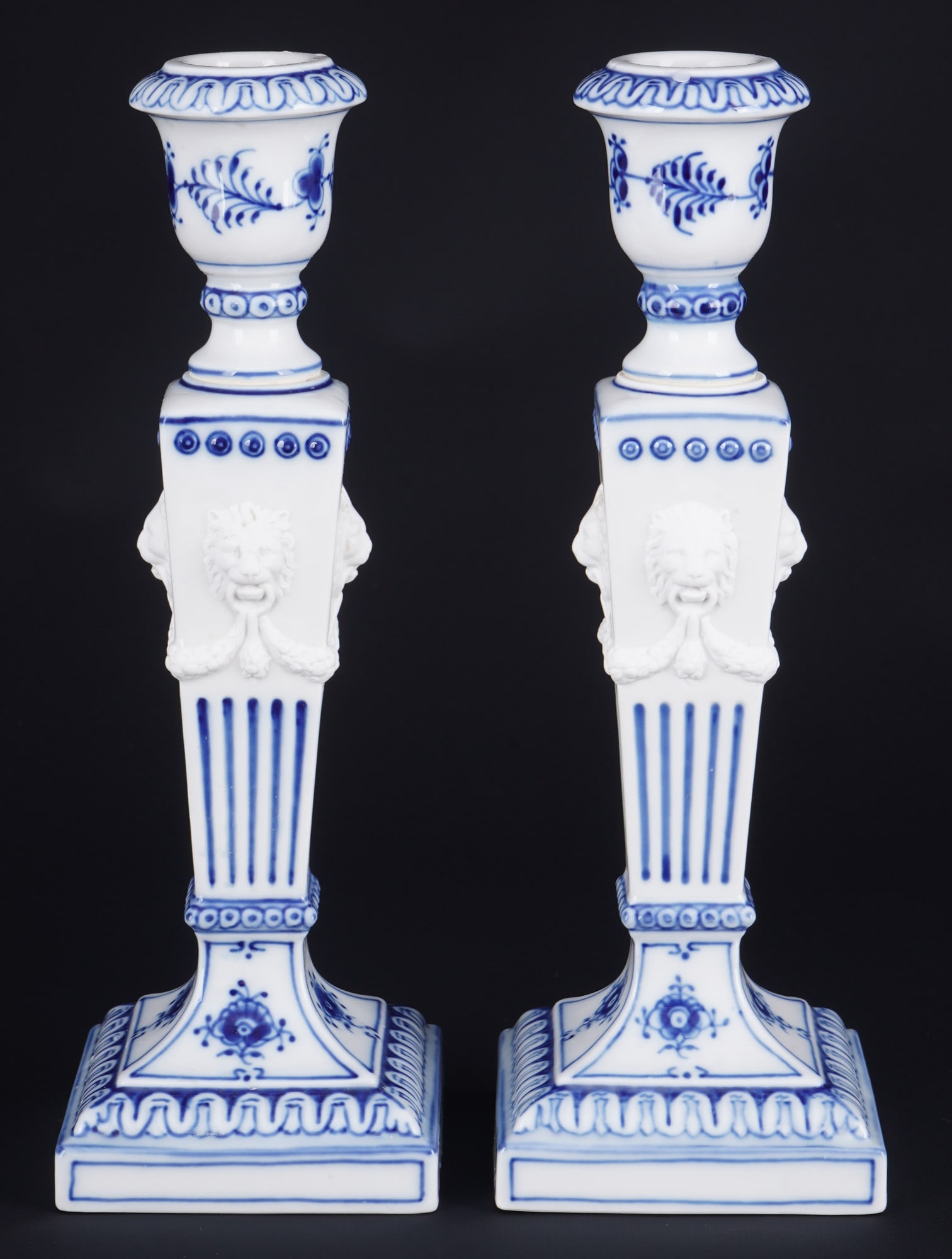 Royal Copenhagen Musselmalet pair of Lion Head candlesticks 15,: porcelain, Denmark, with green company mark and blue waves, decor Musselmalet, model no. 15, 2x H 23 cm x W 7.5 cm