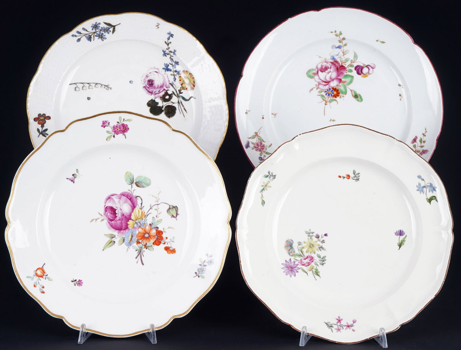 18th century, 4 plates including Meissen, Fuerstenberg,: Set of 4 plates from the 18th century, base marks present (Meissen, Fuerstenberg, Ludwigsburg and others), diameter approx. 25 cm and smaller, wear, signs of age and minor chips.
