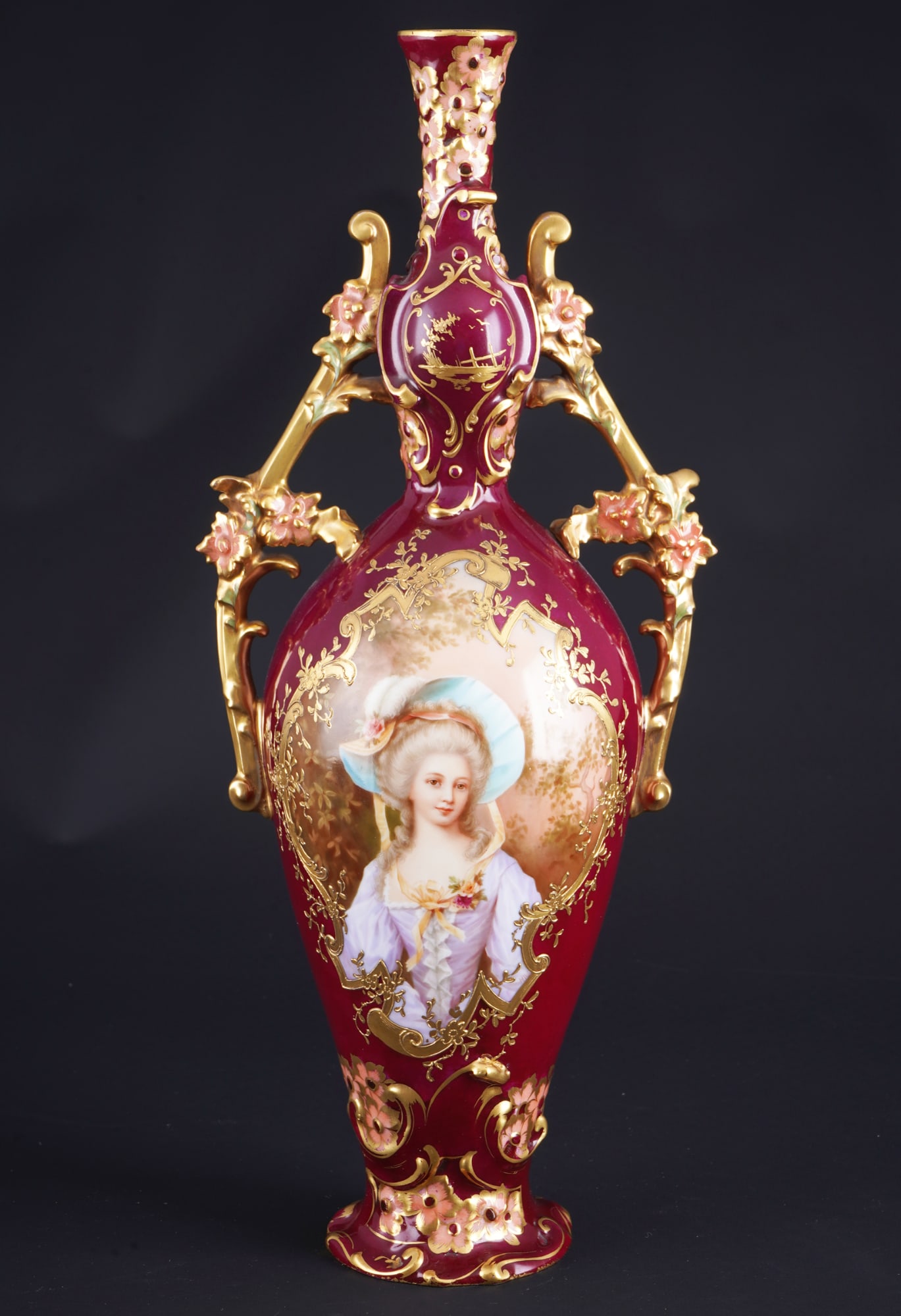 Ornate vase circa 1880-1900, portrait of Marie Antoinette - probably Dresden,: porcelain, France c. 1880-1900, blue compan mark, impressed no.5048, portrait monogrammed H.W., bulbous body with purple ground and rich gold decoration, two gilt branch handles on the sides with appl
