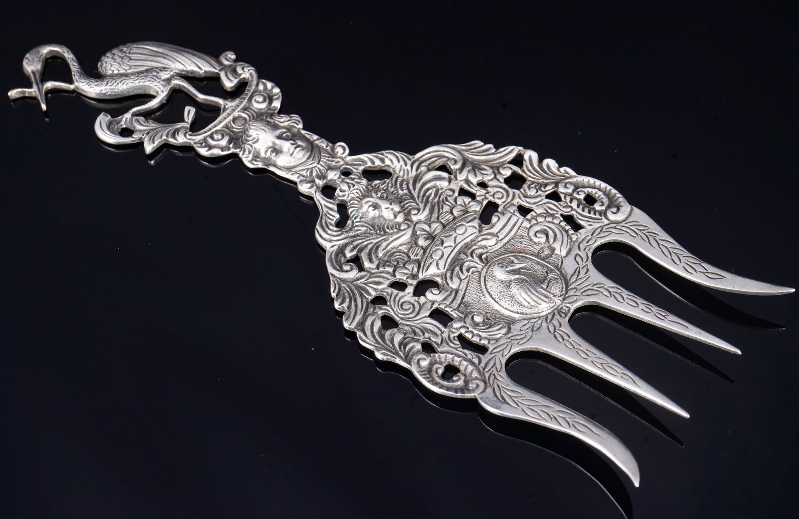 833 silver ceremonial fork, Netherlands circa 1910: 833 silver, stamped with a running lion and 2 (fineness 833/1000) + maker's mark, H 16.5 cm x W 6 cm, weight 51 grams
