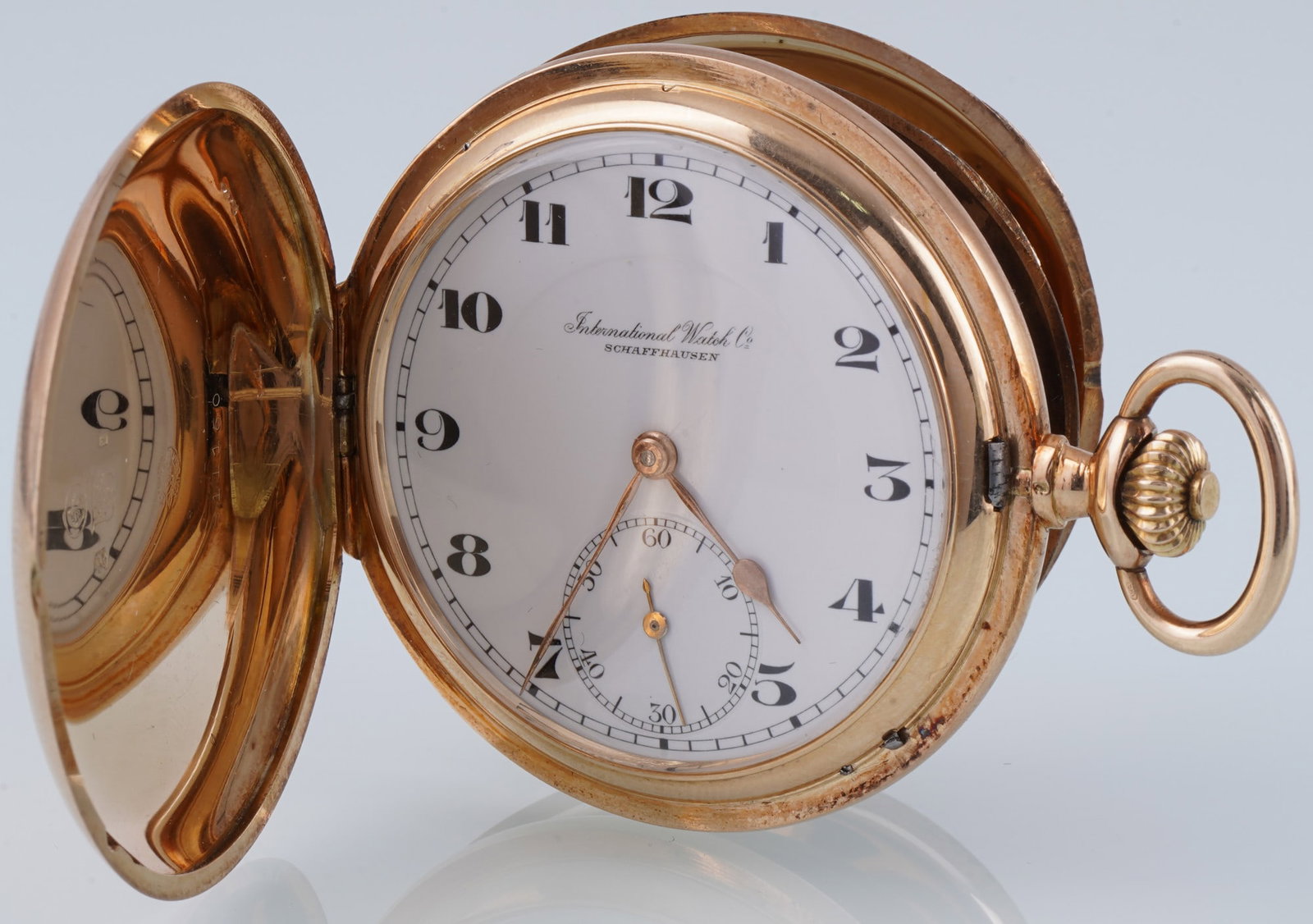 IWC 585 Gold Savonette Pocket Watch: 585 yellow gold, stamped 14K 0.585 56 + IWC + 811160 + crown, IWC mechanical movement - hand-wound no. 784336, enamel dial with Arabic numerals and seconds hand, company inscription International Watc