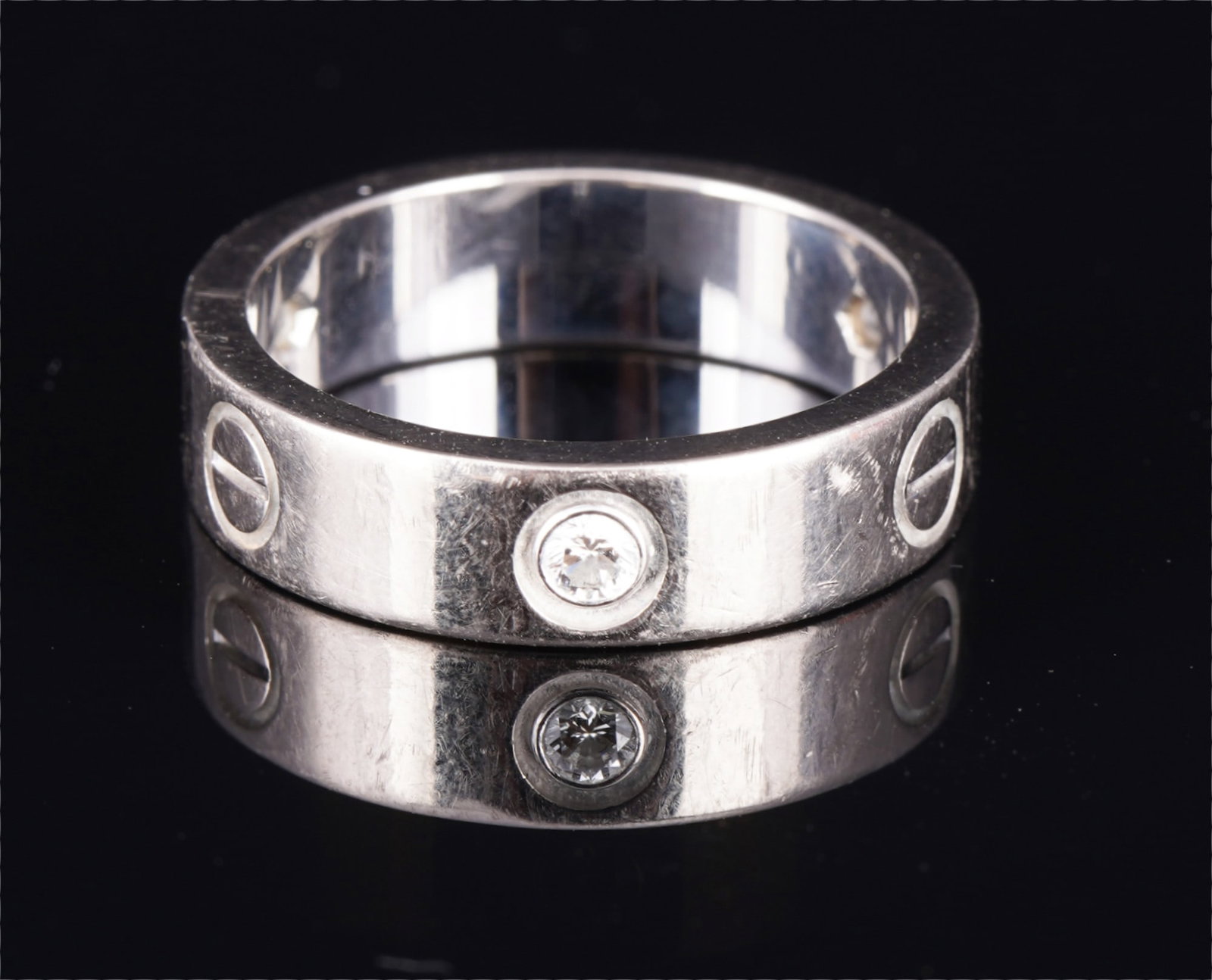 Cartier 750 Gold Love Brillant Ring,: 18k white gold (WG 750), stamped Cartier 750 58 OR 7651, ring with three brilliant-cut diamonds totaling approx. 0.30 ct, size 58, weight 9.9 grams, Ref. OR7651, original Cartier packaging/case and pa