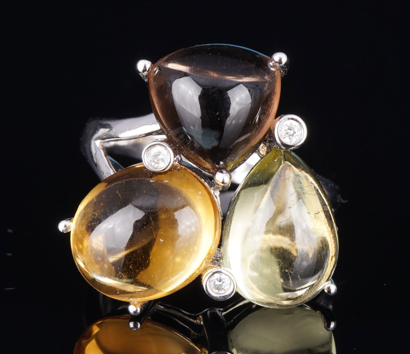 585 gold trilogy cocktail ring,: WG 585 white gold, stamped 14K, modern ladies' ring made of 585 white gold with three differently shaped and color-coordinated cabochon gemstones, H 27 mm, size 55 / 17.6 cm, weight 8 grams