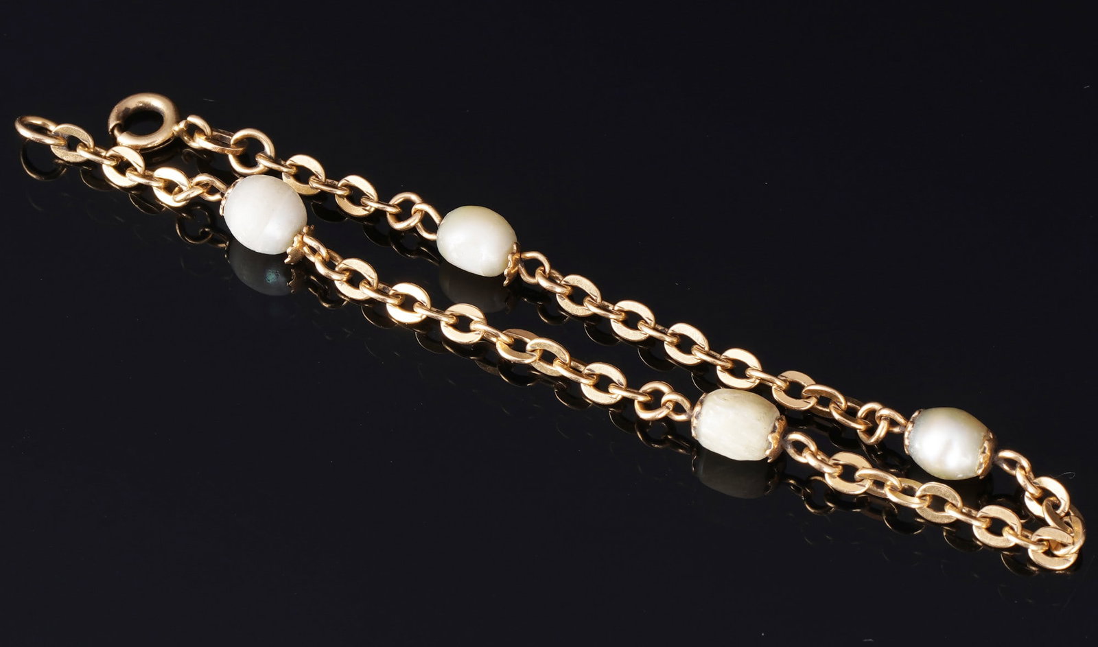 750 gold bracelet with pearl embellishment,: 18k yellow gold (GG 750), stamped 750, gold bracelet with 4 separate pearls, length 17.3 cm, total weight approx. 5.2 grams, pearls rubbed