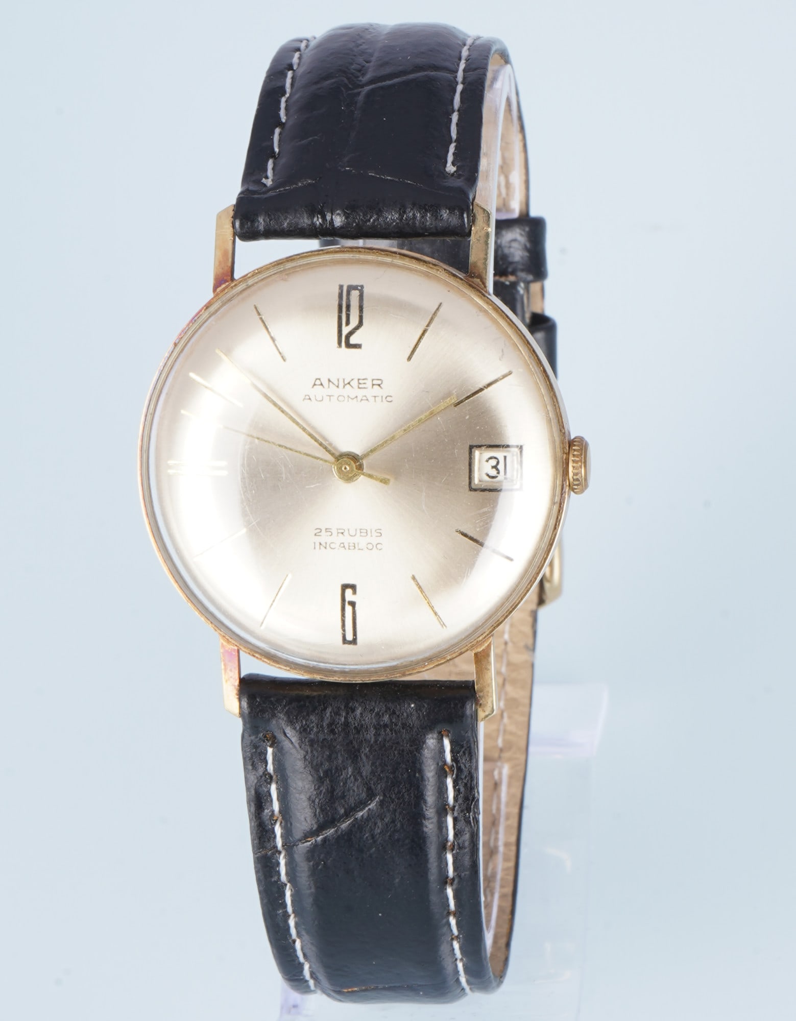 Anker 585 Gold Automatic Men's Wristwatch: 585 yellow gold case, classic design, dial with company logo and baton indices, case back stamped 14K 0.585 + crown, leather strap with pin buckle, L 23 cm, H 39 mm x diameter approx. 34 mm without cr