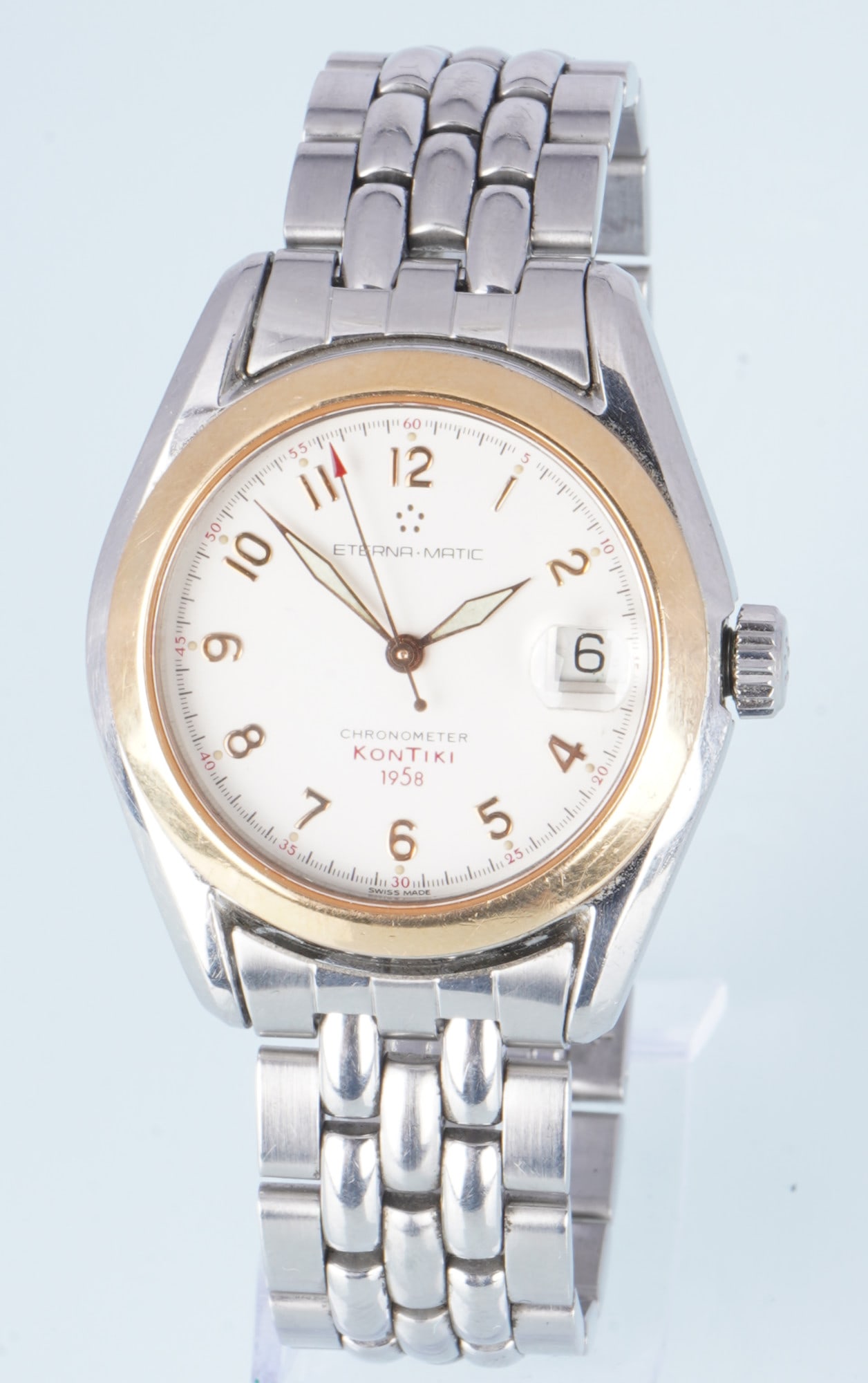 Eterna Matic Kontiki 1958 Automatic Men's Wristwatch: Steel case with 18K gold bezel, model: Kontiki 1958, automatic movement, chronometer, No. 621, Ref. 1573.47.15, cream-white dial, stainless steel bracelet with folding clasp, H 43 mm x W 38 mm (includ