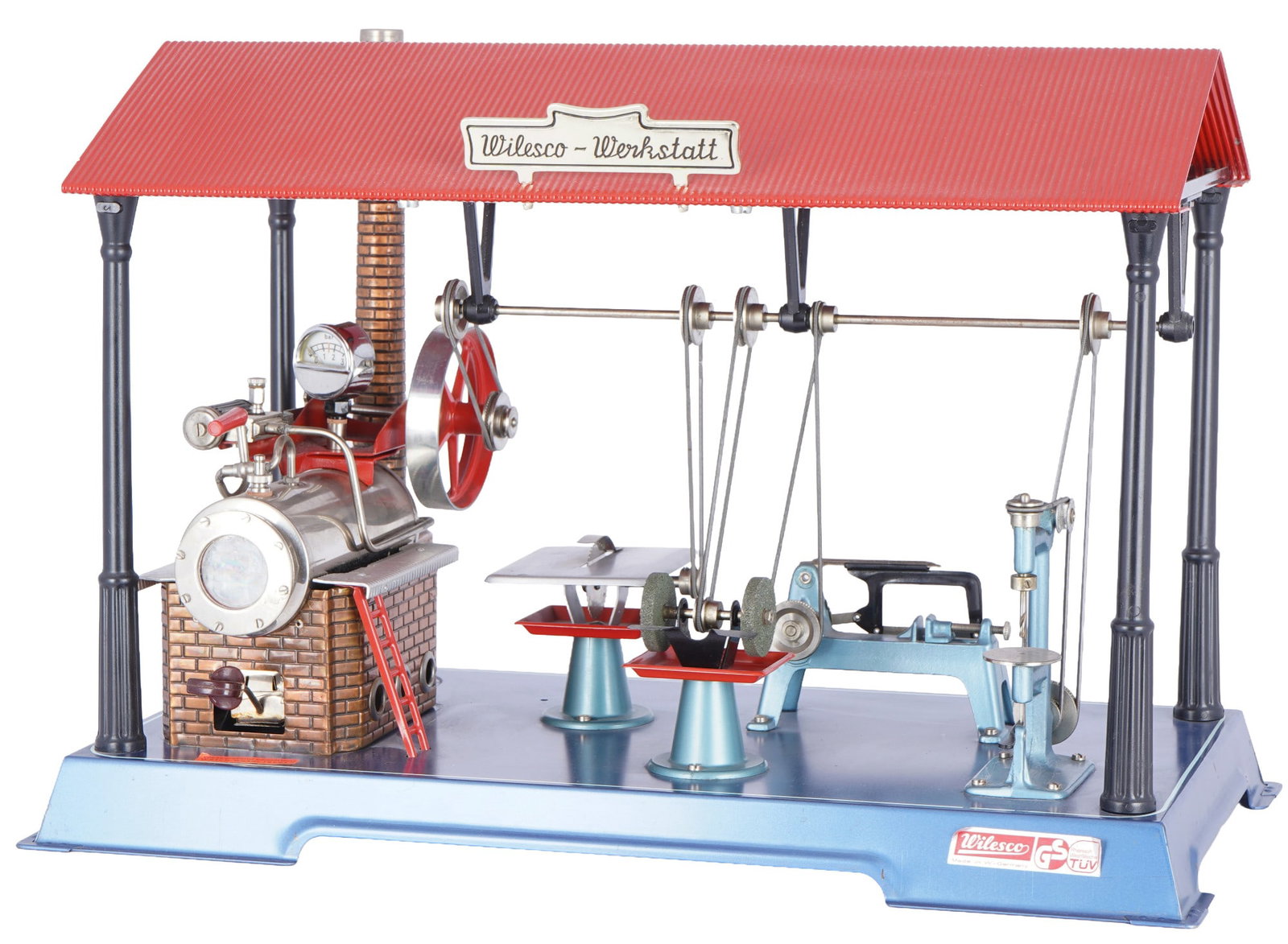 Steam engines - D141 factory with 4 drive models,: Metal / brass, made in West Germany, a detailed replica of a factory from the early days of the Industrial Revolution, the power is transmitted via a transmission shaft attached to the hall ceiling,
