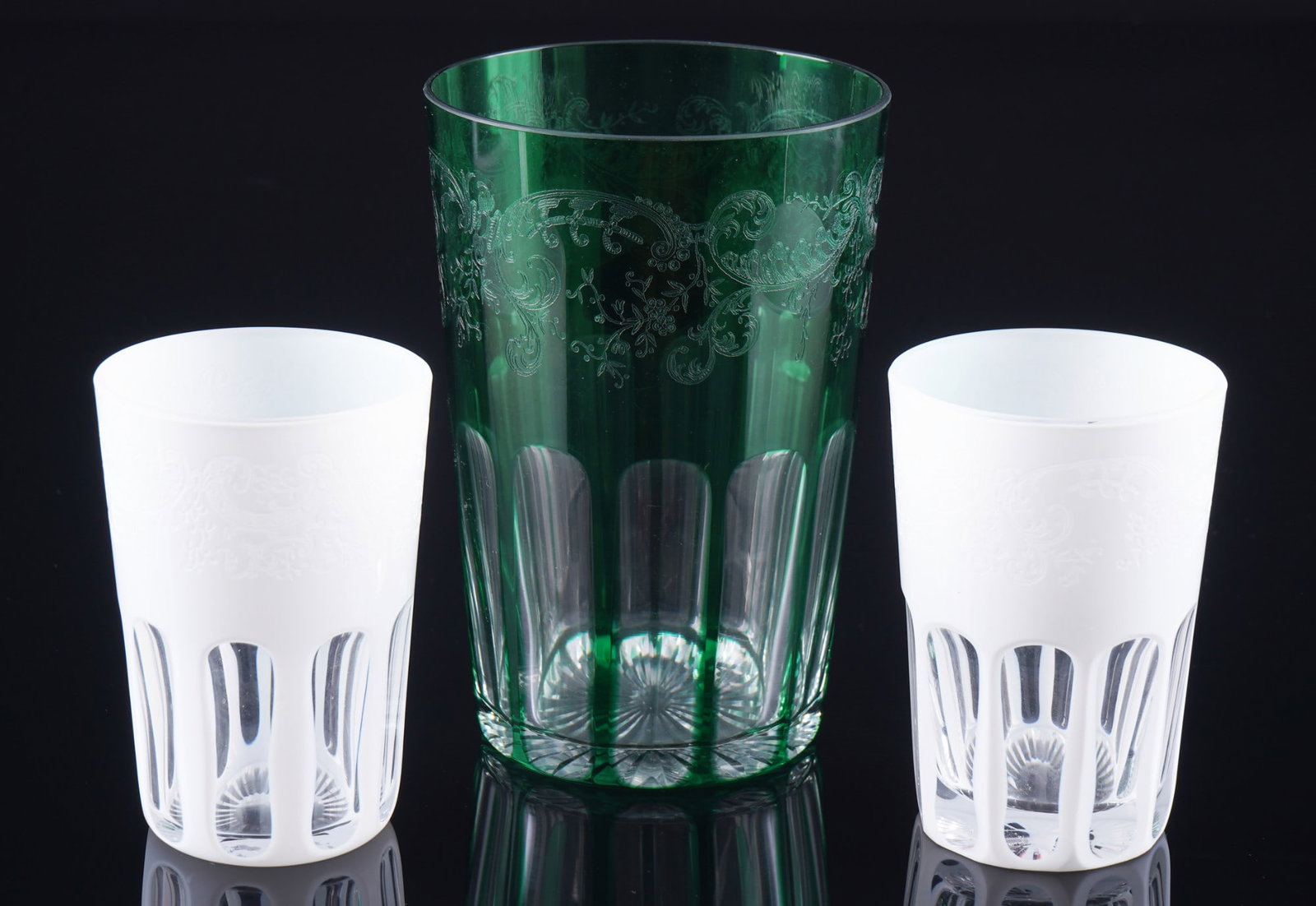 St. Louis highball glass and two white water glasses,: Crystal, France, company sticker, green highball glass H 13.3 cm x D 8.8 cm and two matte white water glasses H 9 cm x D 6 cm