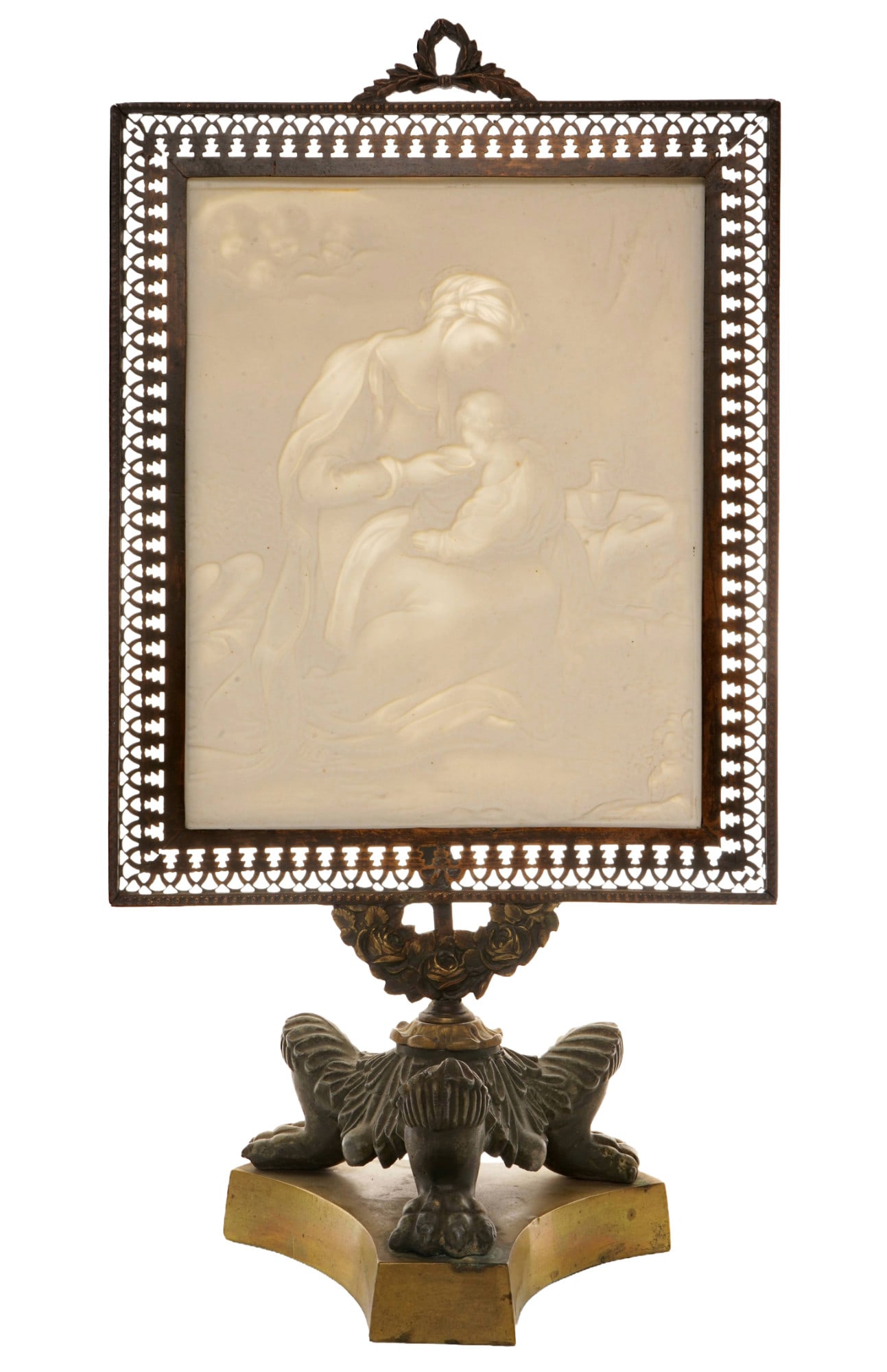 Achille de Thevenet & Cie. lithophany stand around 1840 - Madonna and child "The Feeding",: porcelain, France, monogrammed lower left A.d.T. (Alexis du Tremblay), Madonna feeding Christ, upper left four putti heads, brass/bronze stand on three paws, acanthus leaf and rose decoration, frame w