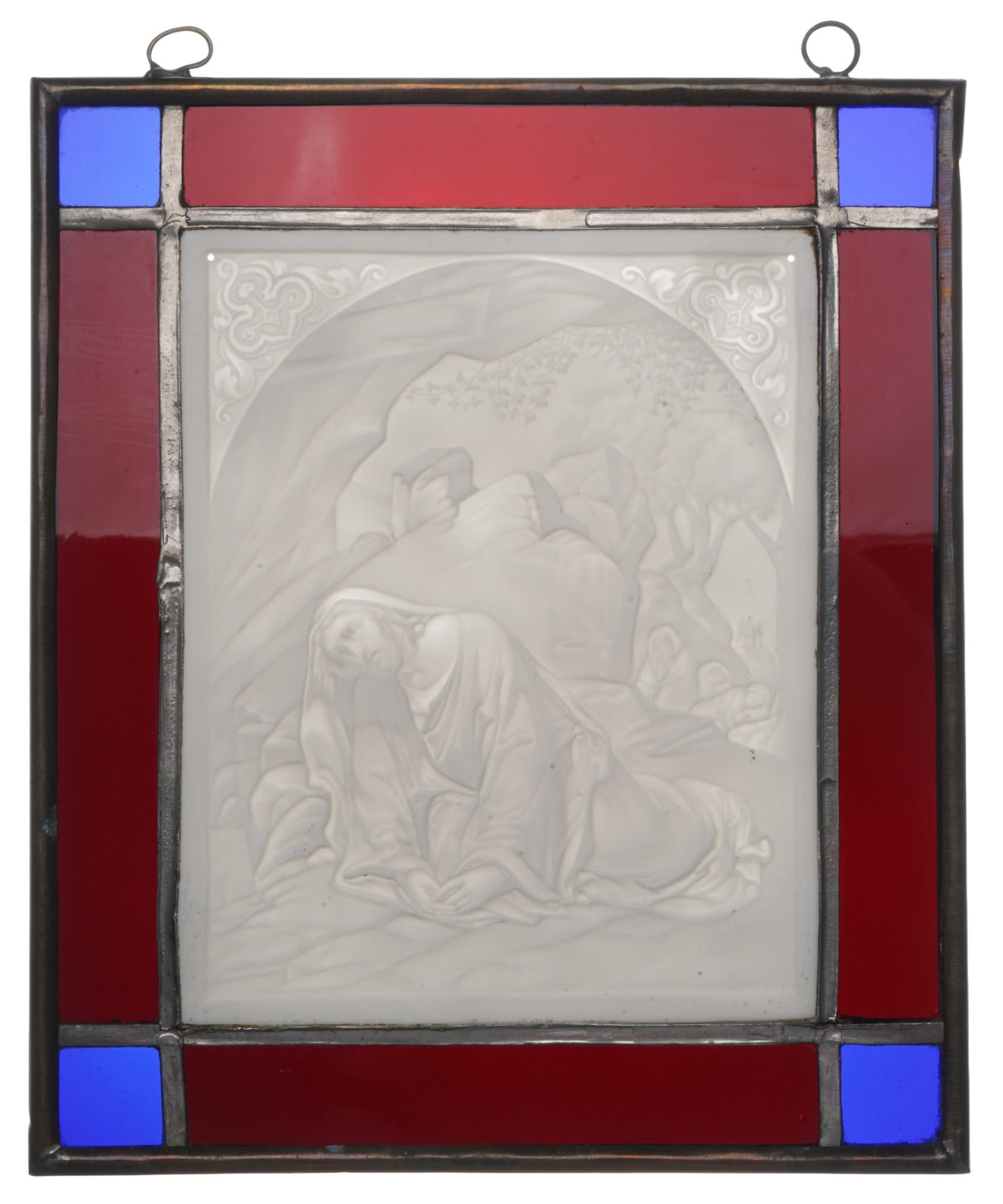 Lithophany in a leaded glass frame c. 1850 - Christ on the Mount of Olives / Gethsemane,: porcelain, Germany, marked G on the reverse, depiction of Jesus Christ in a rocky landscape beneath an olive tree, arched, the two upper corners ornamentally decorated, lithophany H 17 cm x W 13.5