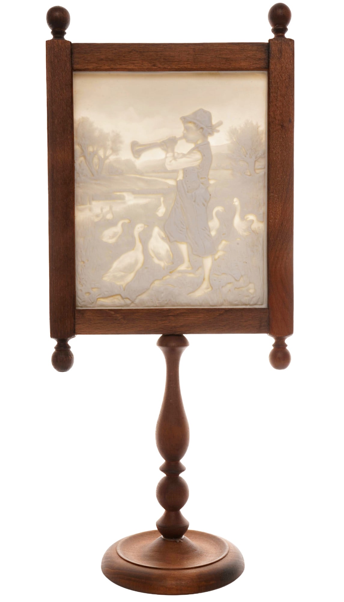 Lithophany stand c. 1860 - shepherd boy with geese,: porcelain, without discernible mark - probably Aelteste Volkstedt, young lad with horn and geese, lithophany H 13.5 cm x W 11 cm, wooden stand 31.5 cm x 13.5 cm, provenance: Lower Rhine private