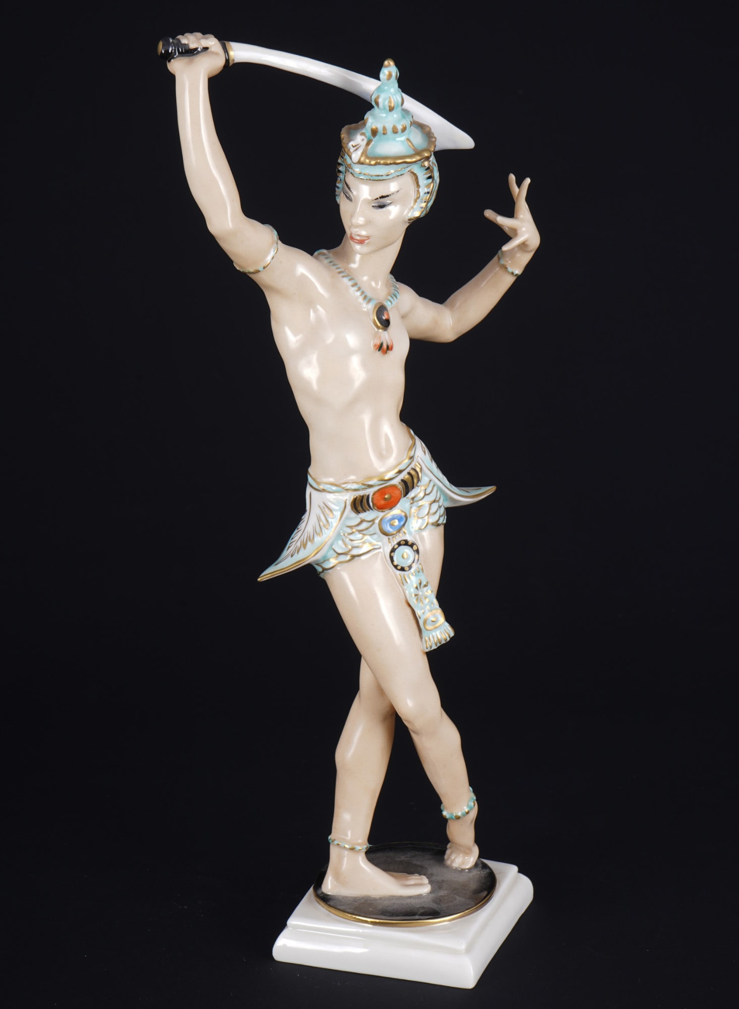 Hutschenreuther balinese sword dancer - Carl WERNER,: porcelain, green company mark, design by Carl WERNER (1895-1980), model no. 8230 (counterpart to the balinese dancer # 8230), H 30.5 cm x W 13.5 cm