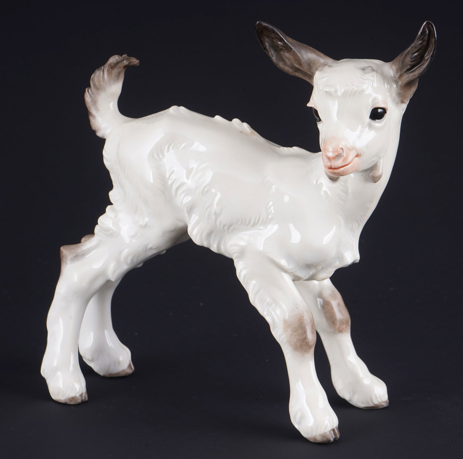 Allach goat kid - Th. KaeRNER,: porcelain, SS Allach press mark 1935?1945, design by Theodor KaeRNER (1884-1966), goat kid, colored, model no. 108, H 14.5 cm x L 15 cm x W 6 cm