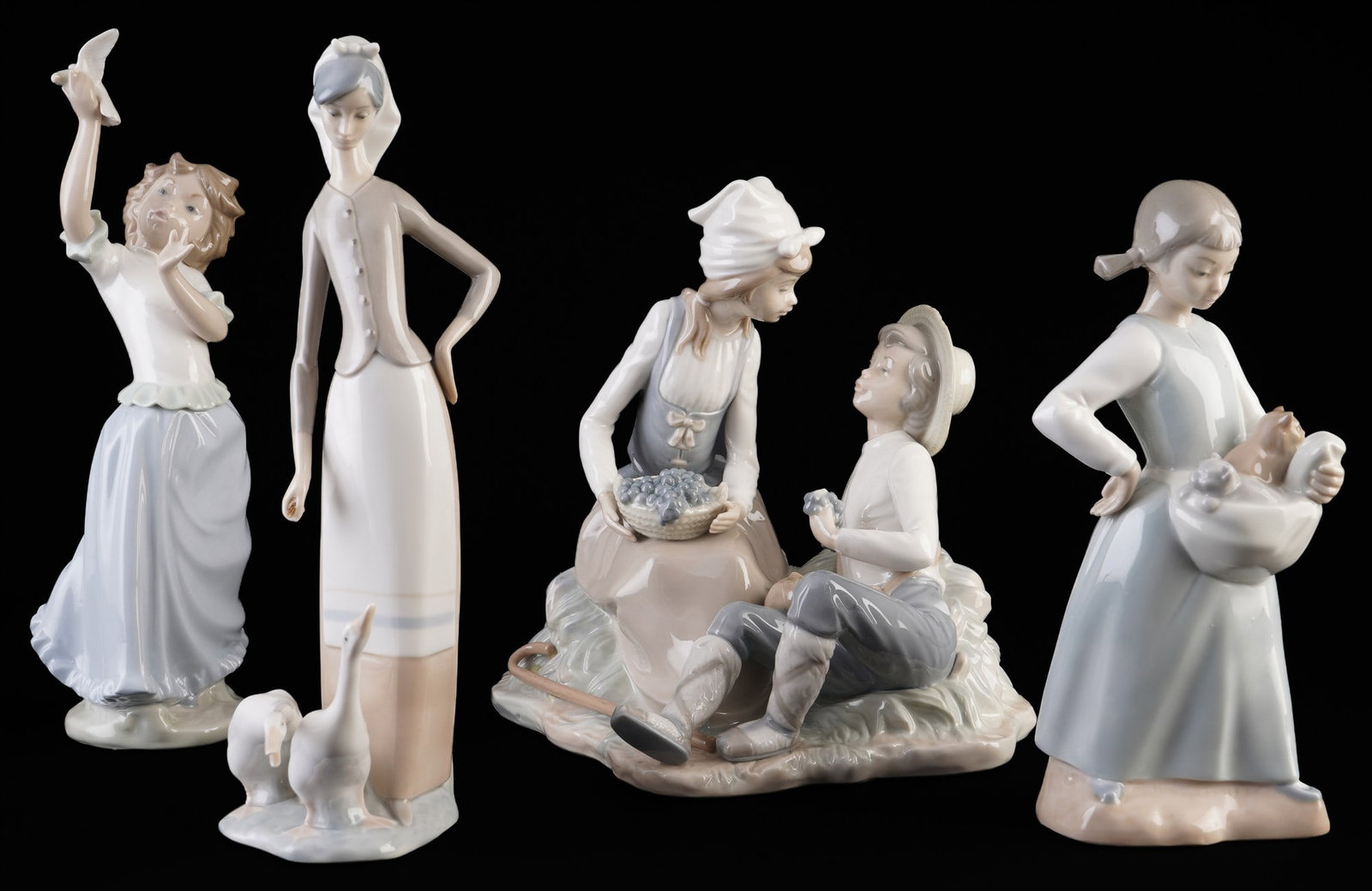 Lladro / Nao 4 porcelain figures, (1 of 5)