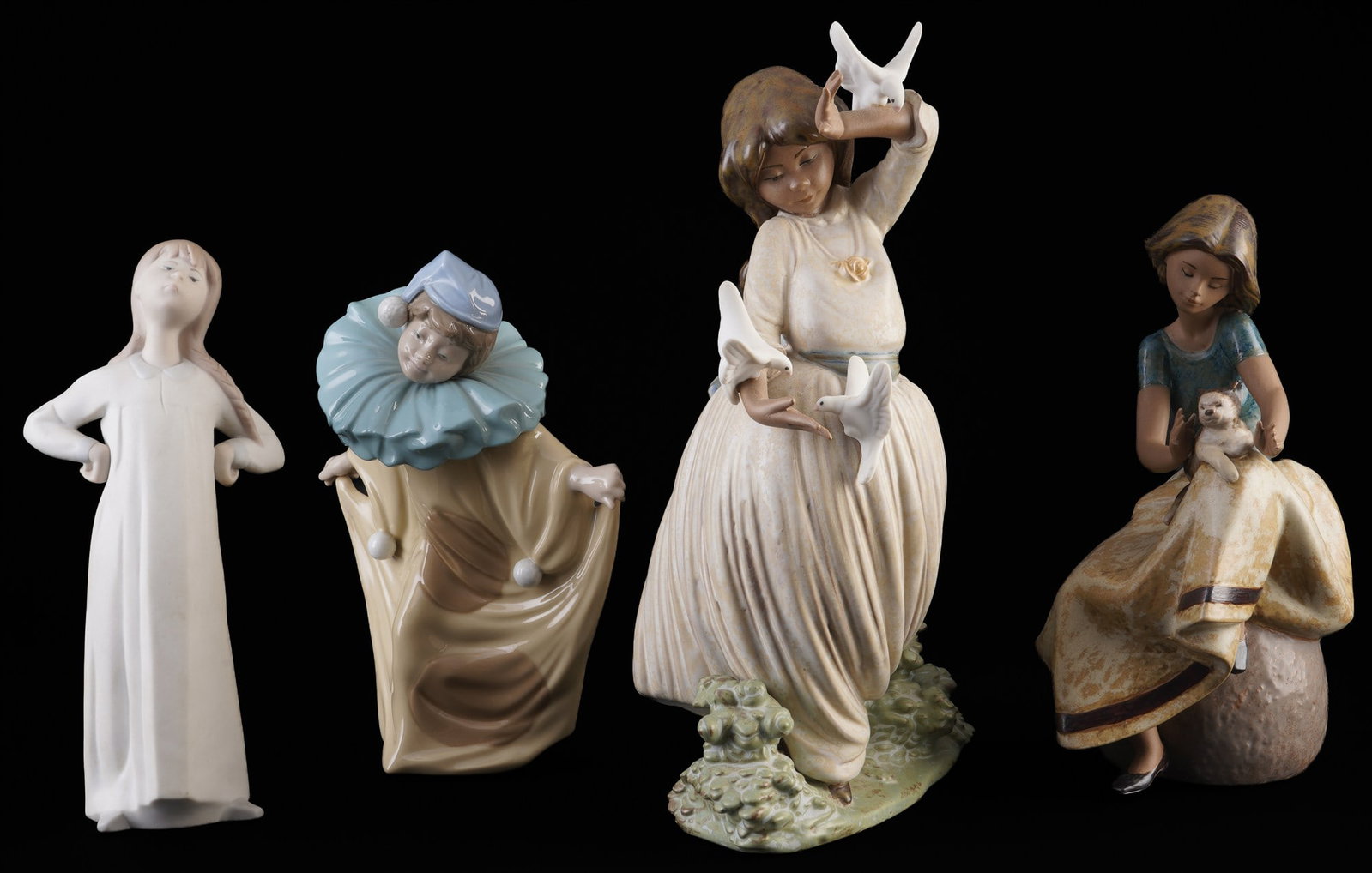 Lladro / Nao 4 porcelain figures, (1 of 5)