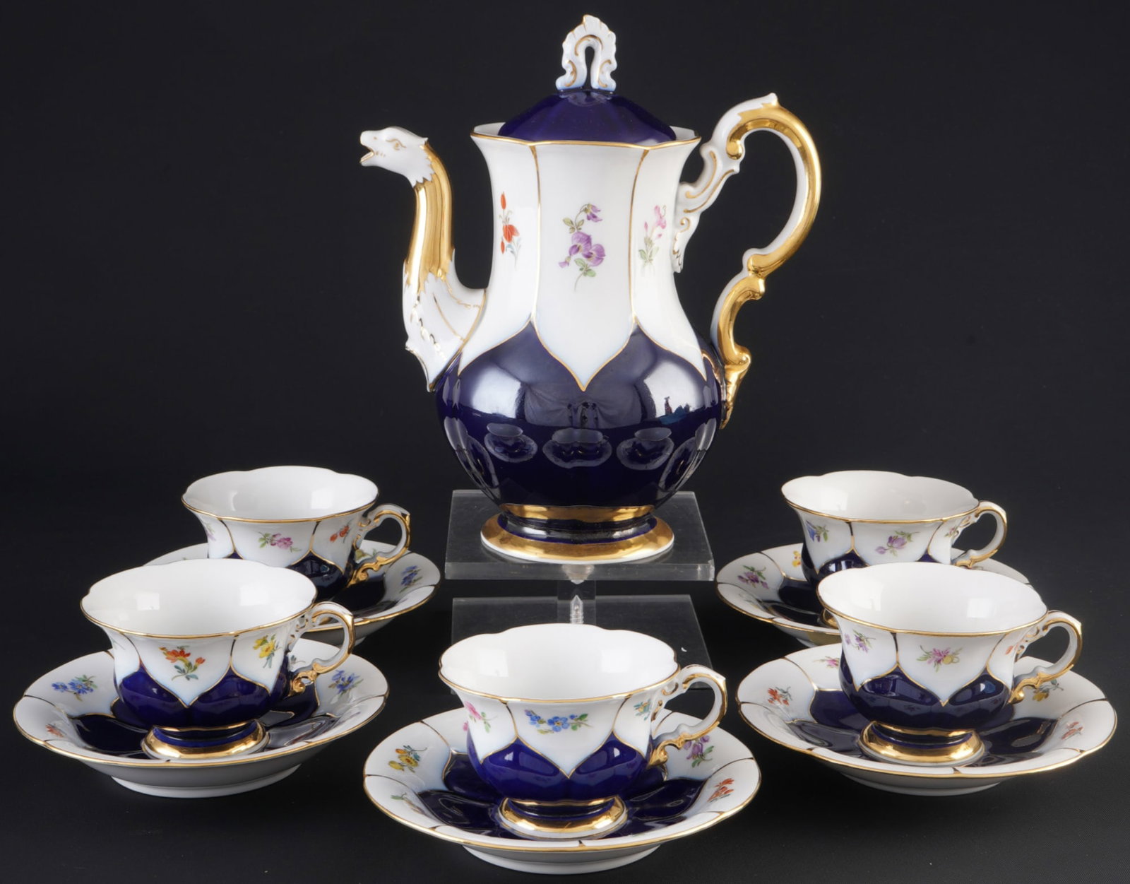 Meissen B-Form Strewn Flowers royal blue mocha set for 5 persons 1st choice,: porcelain, blue sword mark 1st choice, decor B-Form royal blue with Strewn Flowers, spray gold, 1x pot H 19.5 cm x D 10.5 cm, 5x mocha cups H 5.5 cm x D 8 cm, 5x saucers D 13 cm, one saucer and lid of