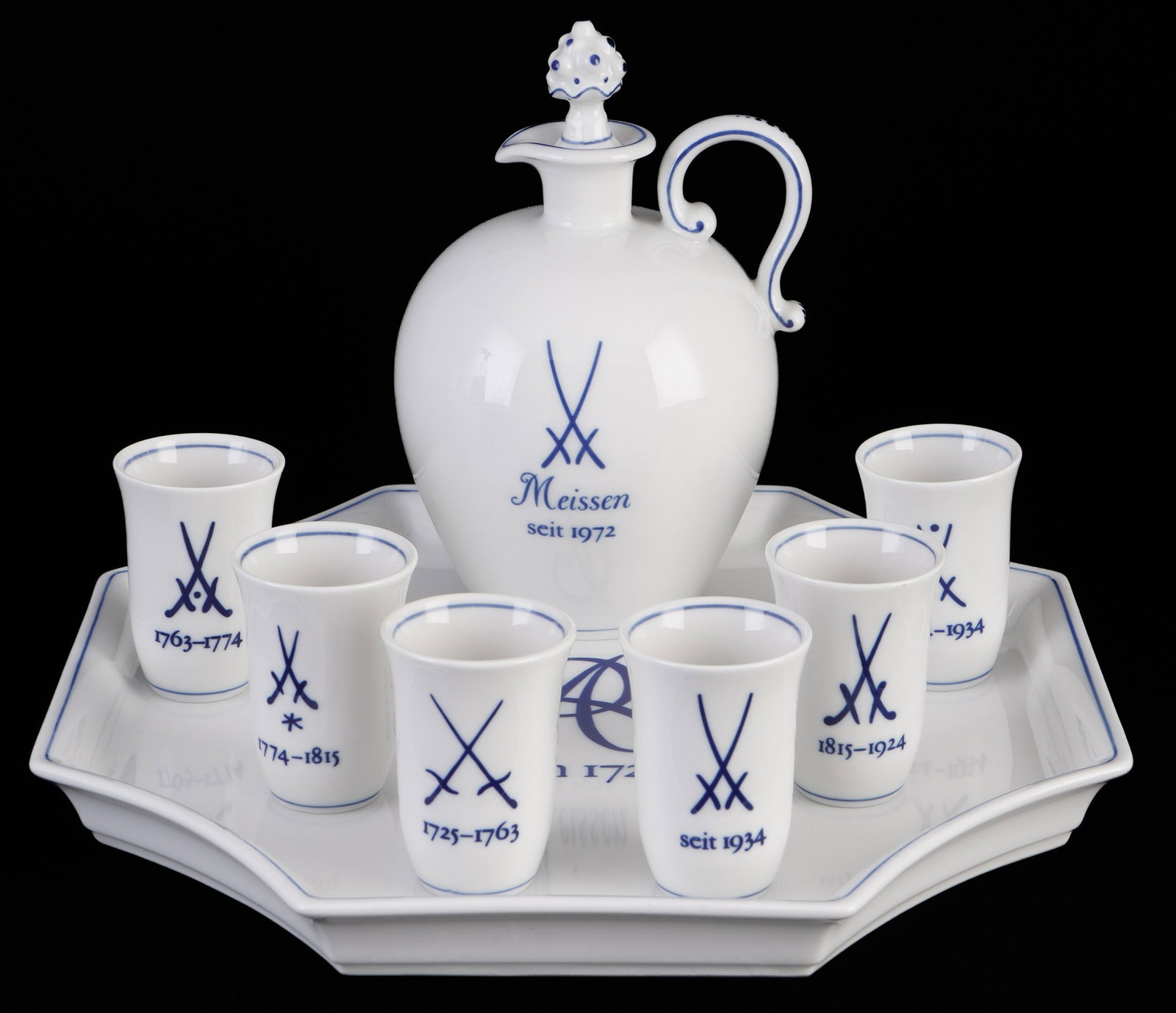 Meissen Meissen Swords liqueur set for 6 persons 1st choice,: porcelain, blue sword mark 1st choice, decor Meissen Crossed Swords, 1x pitcher H 13.5 cm x D 9 cm, 6x shot glasses H 5.5 cm x D 3.5 cm, 1x tray W 22 cm x D 22 cm
