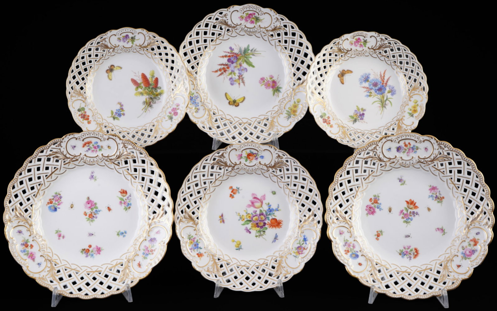 Meissen Flowers 6 cutwork plates 1st choice - various floral paintings,: porcelain, blue sword mark 1st choice, including knob mark 1815-1924, various floral decorations - including Flower Bouquets with butterflies, Wildflowers and Strewn Flowers, 2x D 20.5 cm, 2x D 18.5 c