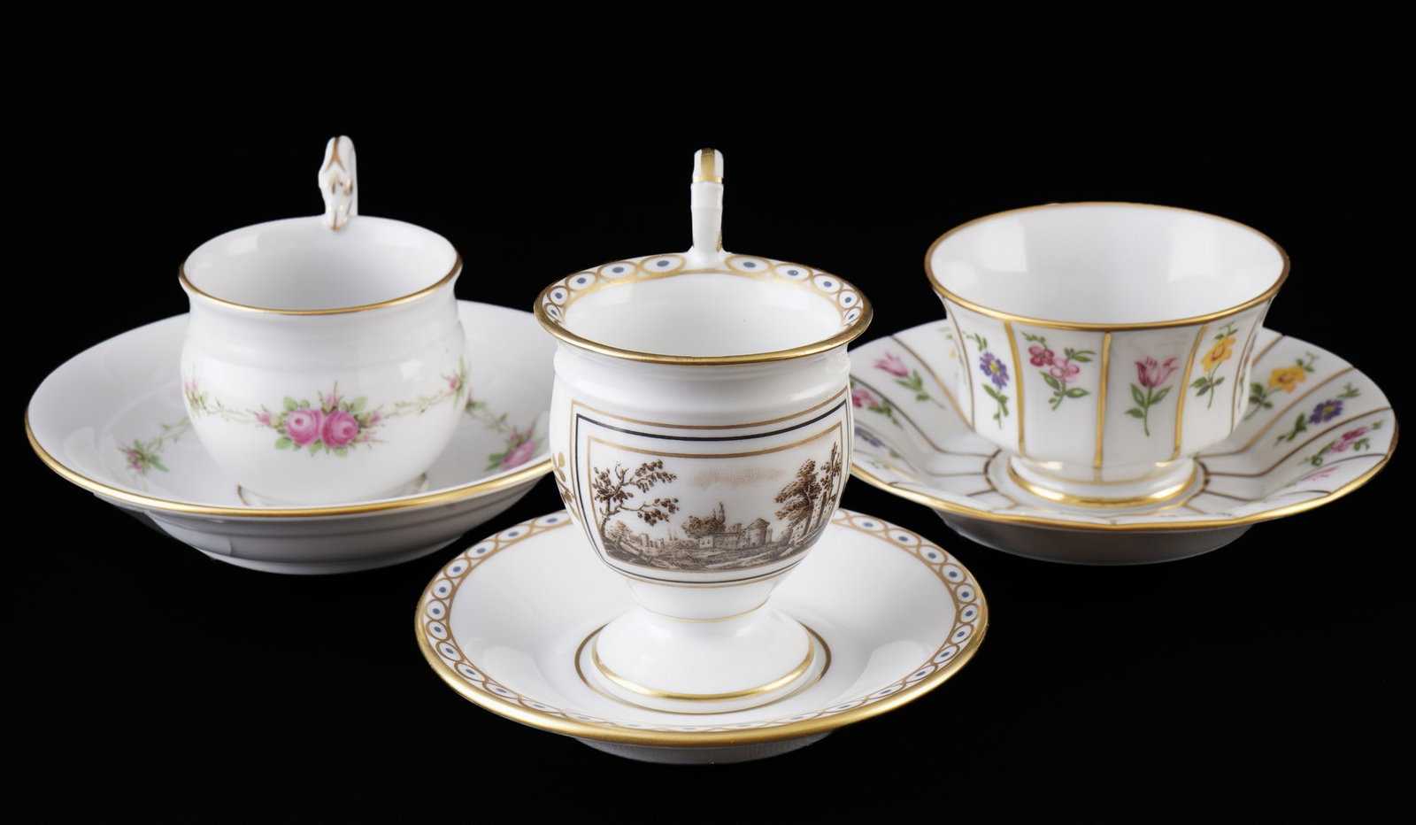 Meissen, Fuerstenberg, Richard Genori 3 mocha cups,: porcelain, blue sword mark (M) / blue company mark (F) and green company mark with stamp (R.G.), Meissen Red Rose pattern with swan-neck handle, Fuerstenberg Mille Fleurs Grecque pattern, Richard Geno