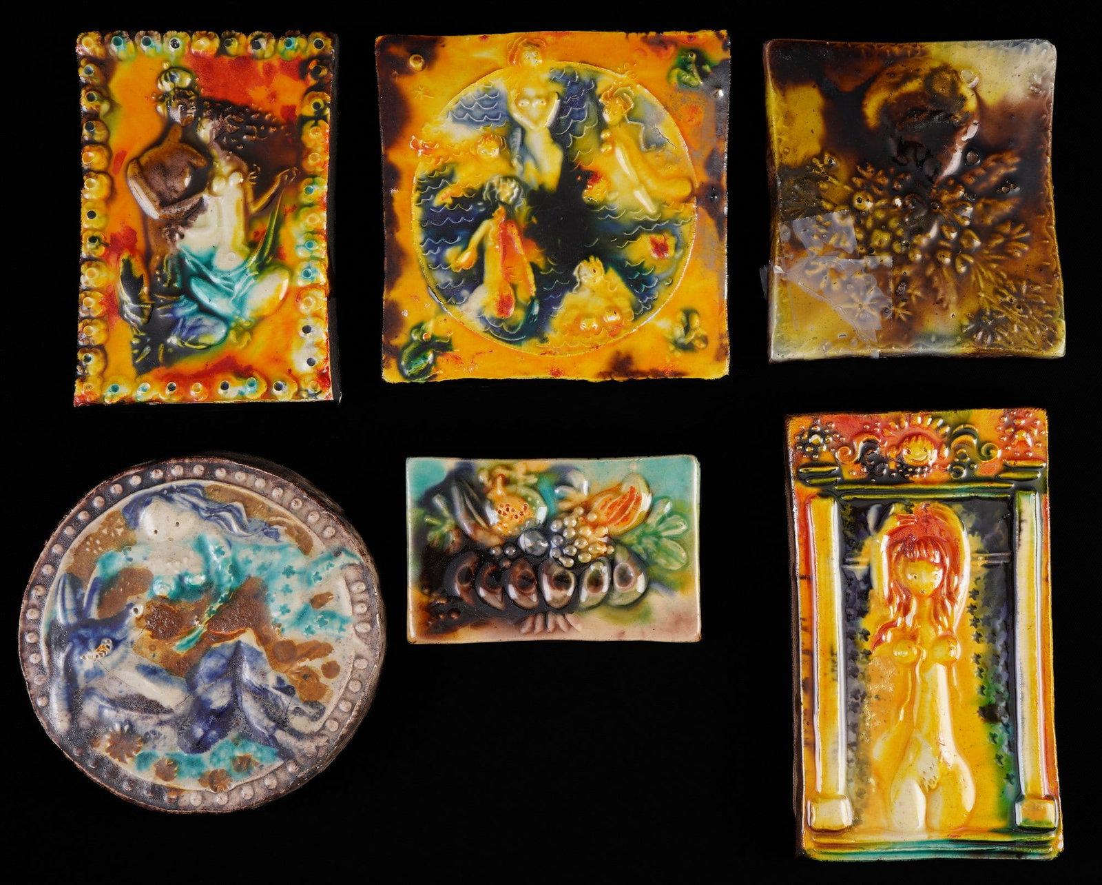 Heinz WERNER (1928-2019) 6 relief plaques / wall tiles,: porcelain/ceramic, artist's mark/imprint on reverse, designed by Prof. Heinz WERNER (1928?2019) around 1980, various motifs ? figurative depictions and fruit still lifes, rectangular/square/round, 1x 