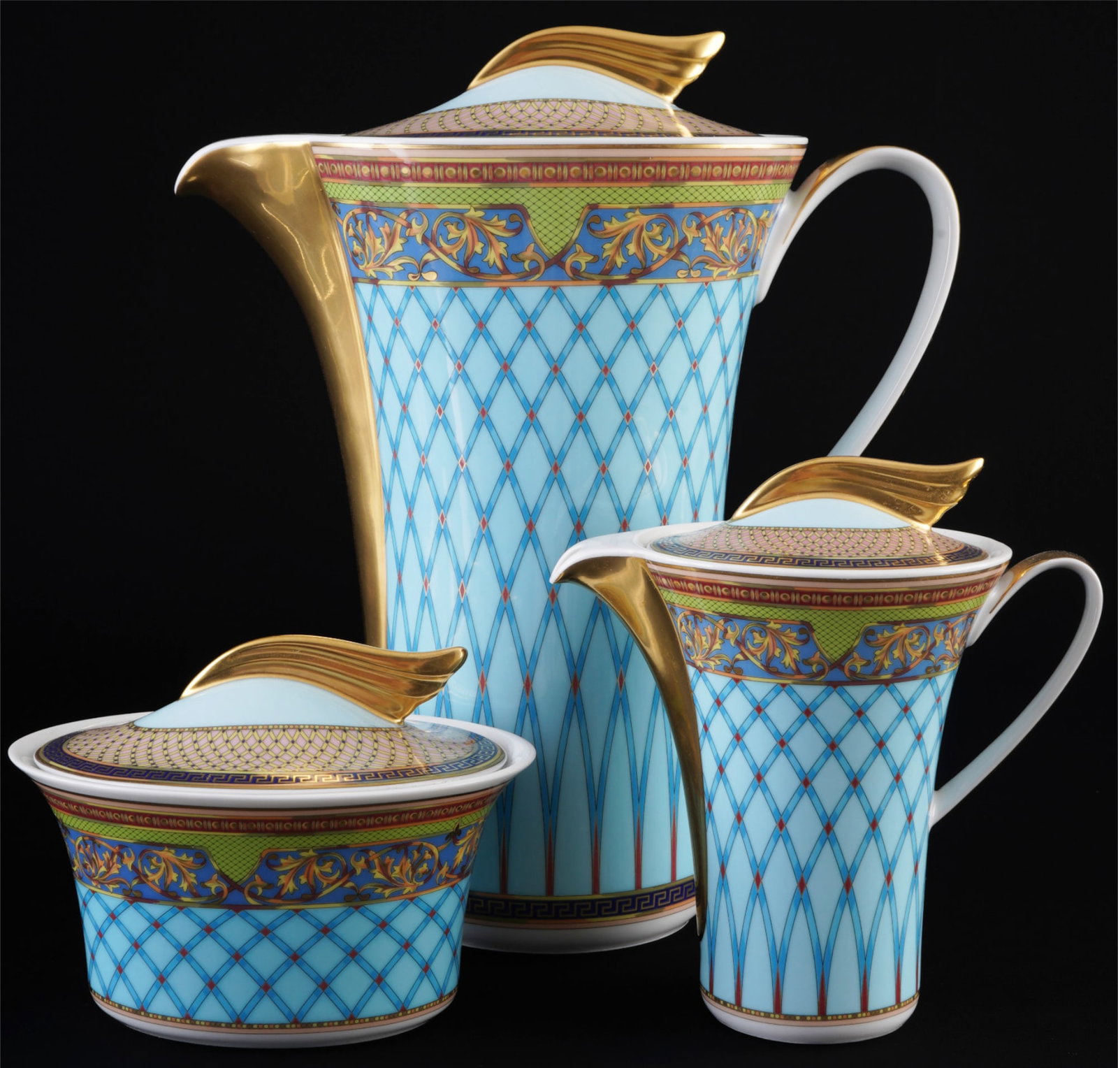 Rosenthal Versace Russian Dream 3-piece coffee set,: porcelain, black and gold company mark, decor Versace Russian Dream, shape Icarus, design by Paul WUNDERLICH (1927-2010), 1x coffee pot H 24 cm x L 21 cm x W 10 cm, 1x milk jug H 14 cm x L 13 cm x W 7
