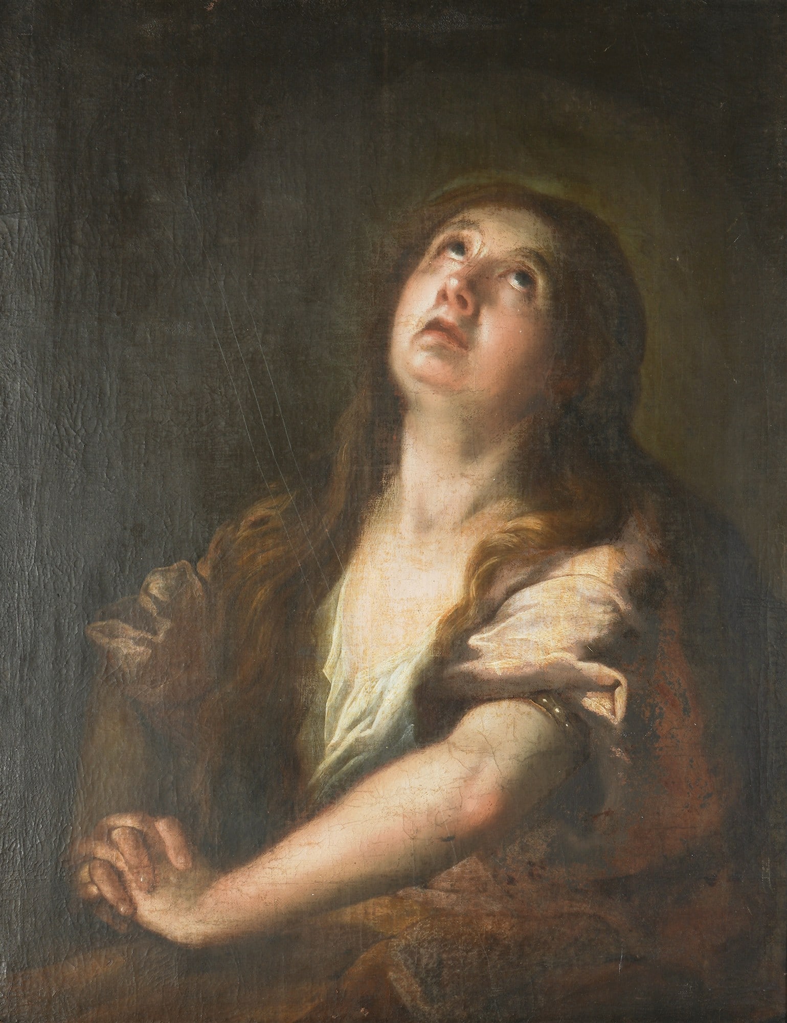 Italian Master, 18th century, The Penitent Mary Magdalene: Oil on canvas, no discernible signature, unknown 18th-century Italian Old Master, depicting Saint Mary Magdalene with long hair, folded hands, and gaze raised to heavenH 64.5 cm x W 51 cm, framed 81 c