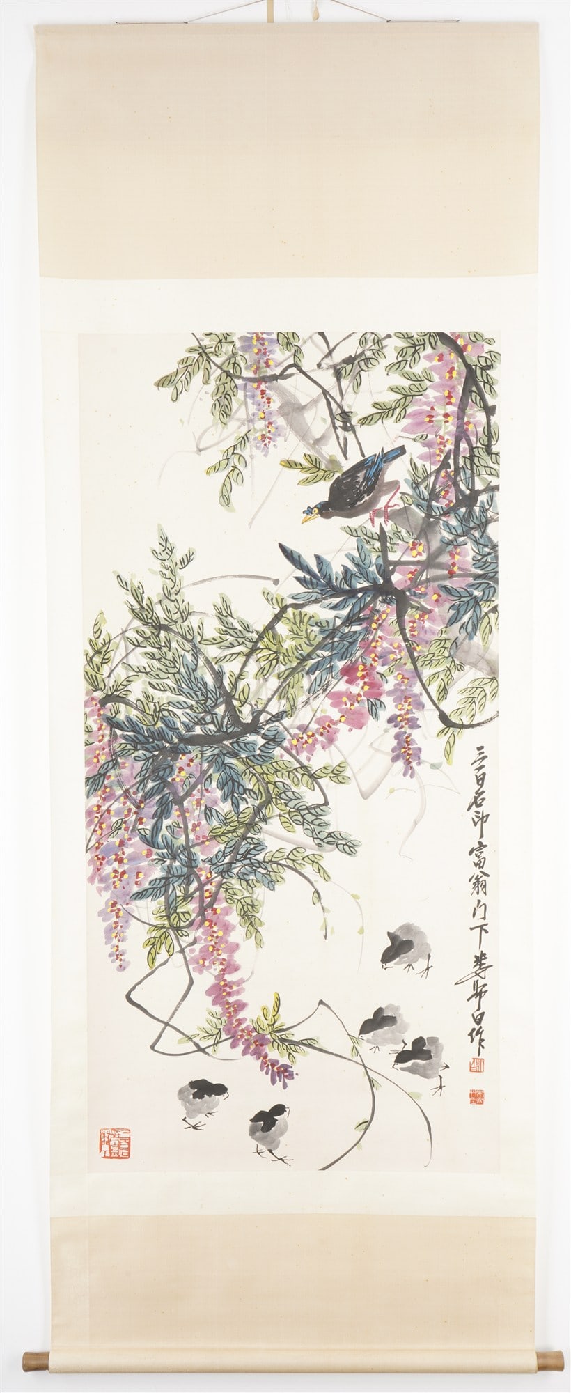 Scroll painting with wisteria and chicks, signed Lou Shibai, China: Ink and paint on rice paper as a hanging scroll, China, 20th century, artist's seal Lou Shibai (1918–2010), a lush wisteria branch with purple flower clusters, below which play young chickens, execu
