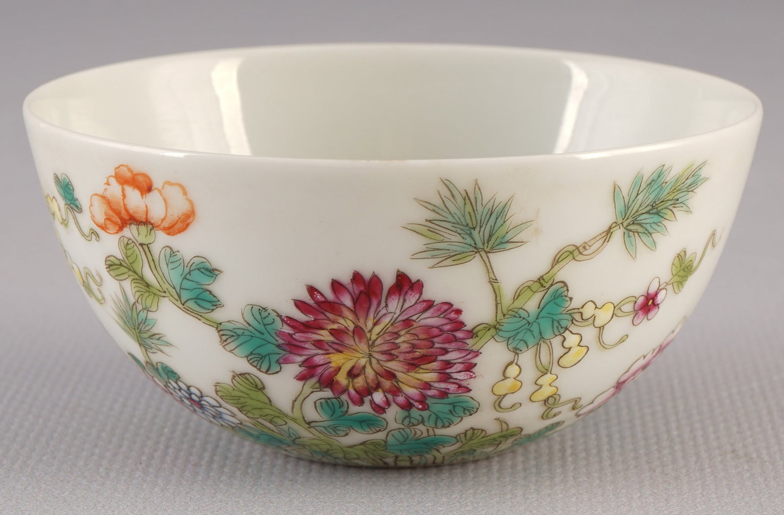 Famille Rose bowl, China, 20th century: Porcelain, China, 20th century, Famille Rose bowl, painted with various flowers, signed with Yongzheng seal mark, H 3.8 cm x D 8.2 cm