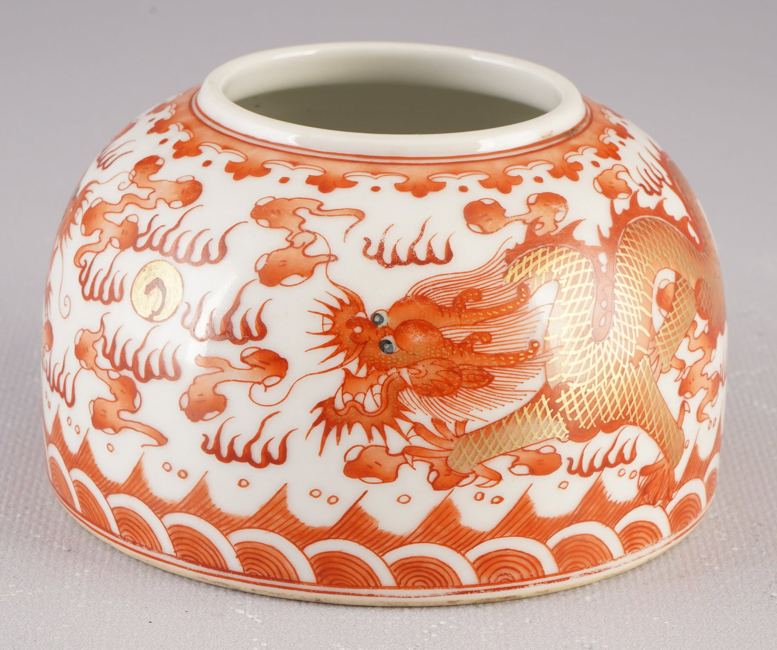 Fine ink water bowl with famille rose painting, China, 19th/20th century: Porcelain, China, 19th/20th century, fine water bowl with dragons and clouds in iron red and gold, with a 6-character Guangxu mark on the base, H 6.7 cm x D 10.8 cm, from a European private collection