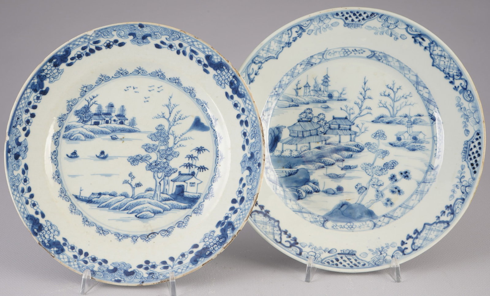 Pair of blue and white plates, China, Qing Dynasty: Porcelain, China, Qing Dynasty (1644–1911), pair of plates with blue and white painting, painted with a landscape, D 23.6 cm, D 23 cm, chip on the rim