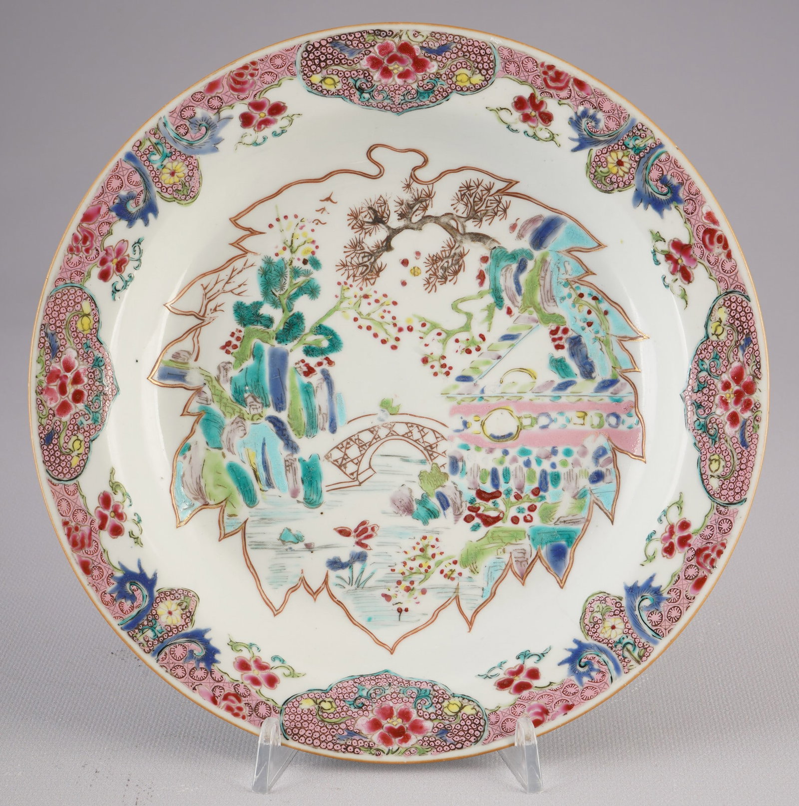 Rare Famille Rose plate, China, Yongzheng period,: Porcelain, China, Qing Dynasty, Yongzheng period (1722–1735), rare Famille Rose plate with exceptional landscape and detailed gold lines, diameter 22.8 cm, with a slight crack, good condition, Europ