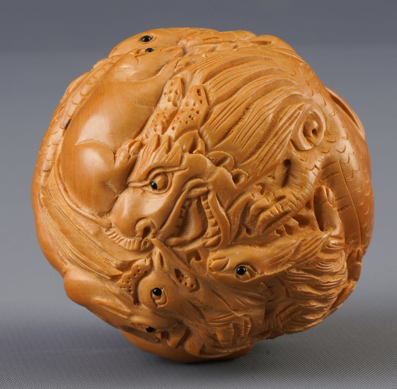 Carved handle ball "Twelve Zodiac Signs", China, 2nd half of the 20th century,: Wood, China, second half of the 20th century, carved handle ball "Twelve Zodiac Signs" made of boxwood, diameter 6 cm