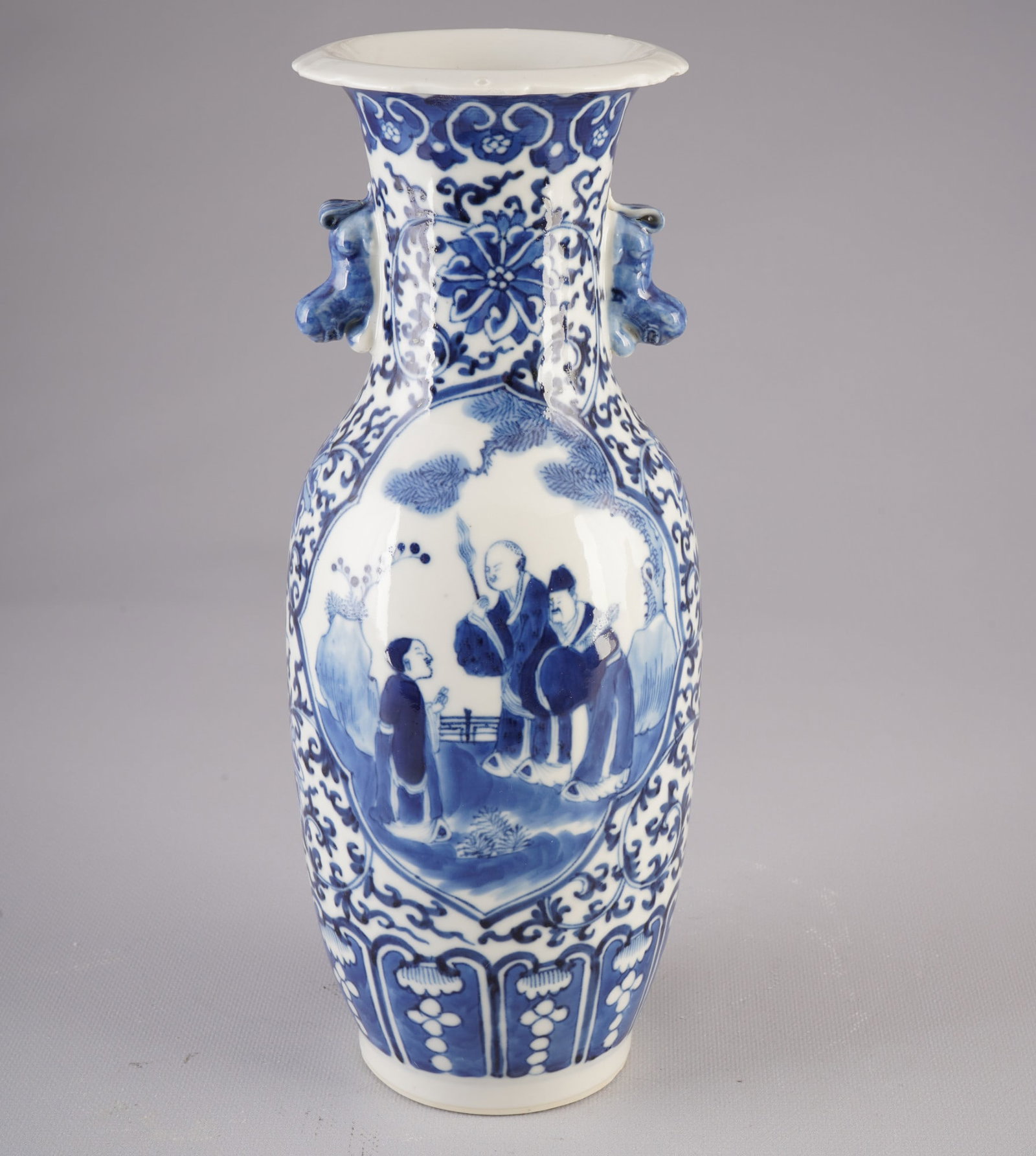 Blue and white vase with figurative scenes, China, Qing Dynasty,: Porcelain, China, Qing Dynasty (1644–1911), blue and white vase with figural scenes and floral motif, with a 4-character Kangxi mark on the base, H 31 cm x D 12.5 cm, small chip on the rim, from a E
