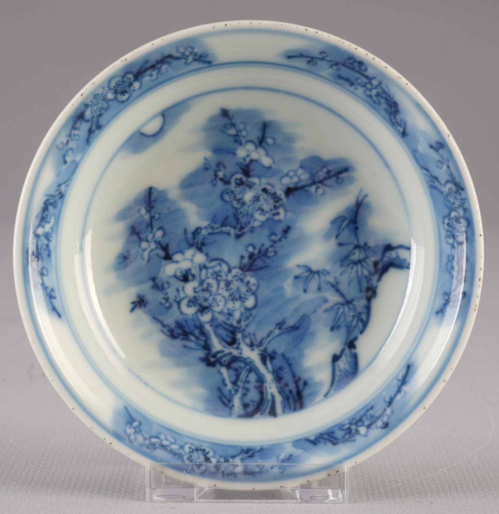 Blue and white plates with plum tree, China, 19th/20th century: Porcelain, China, 19th/20th century, blue and white plates with plum tree and new moon patterns, signed with Kangxi seal mark, H 2.6 cm x D 9.6 cm