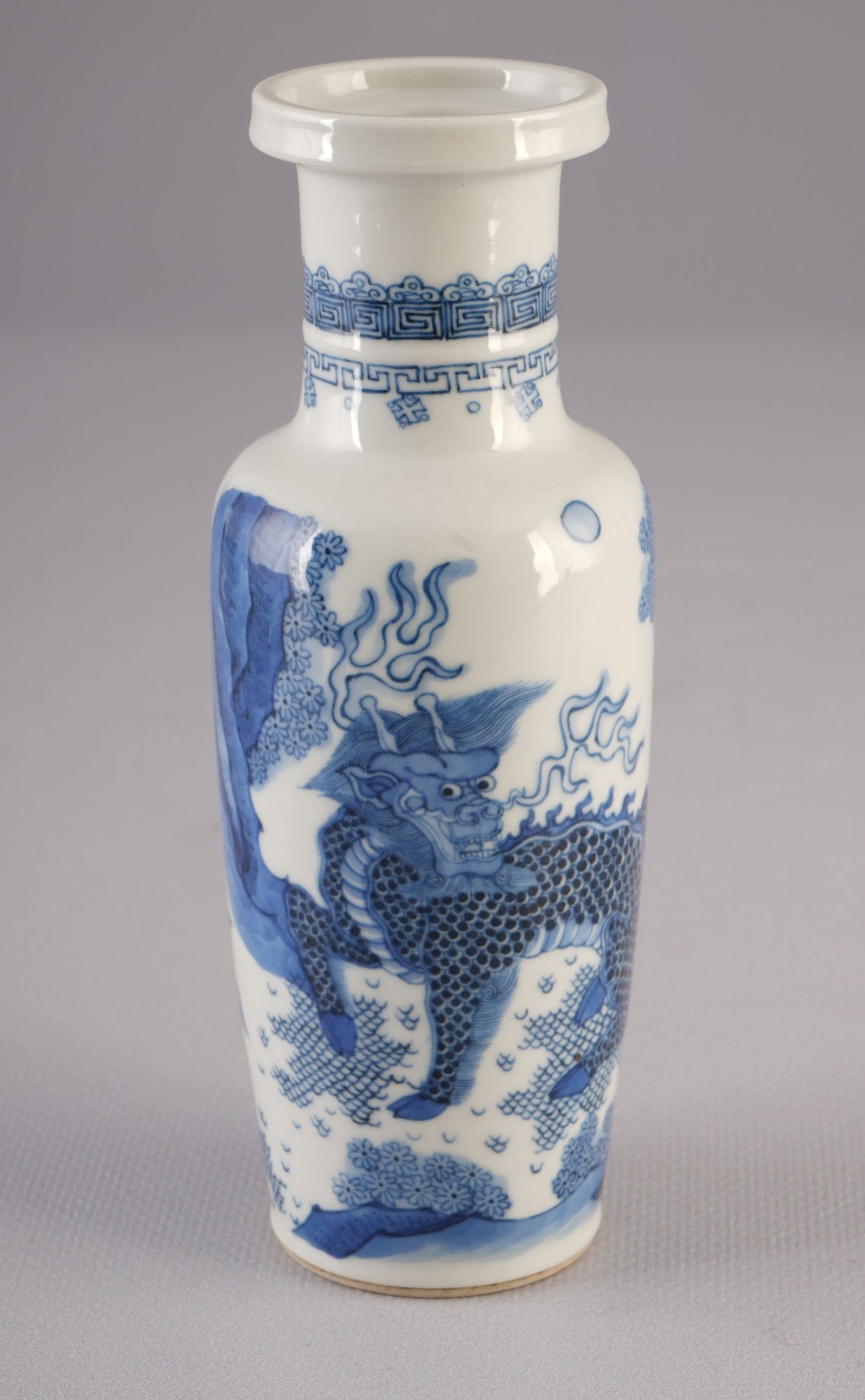 Blue and white vase with Qilin motif, China, probably transitional period.: Porcelain, China, probably transitional period, Ming to early Qing dynasty, blue and white vase with qilin and banana leaves, base signed, H 15.7 cm x D 5.5 cm, German private collection