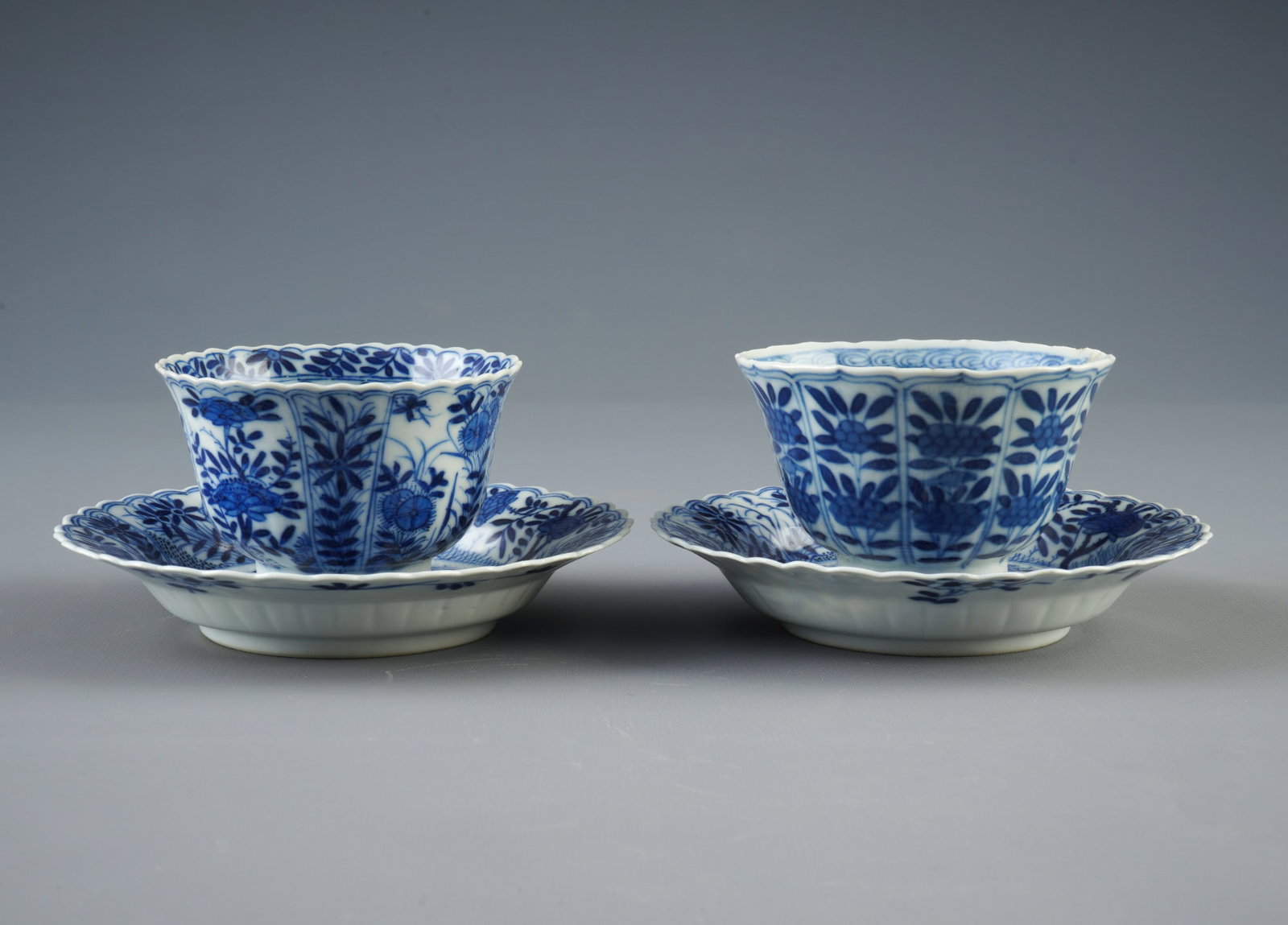Two blue and white teacups with saucers, China, Qing Dynasty,: Porcelain, China, Qing Dynasty, two blue and white teacups with saucers, cups H 5.5 cm × D 8.5 cm, saucers D 13.5 cm, one cup with a chip on the rim