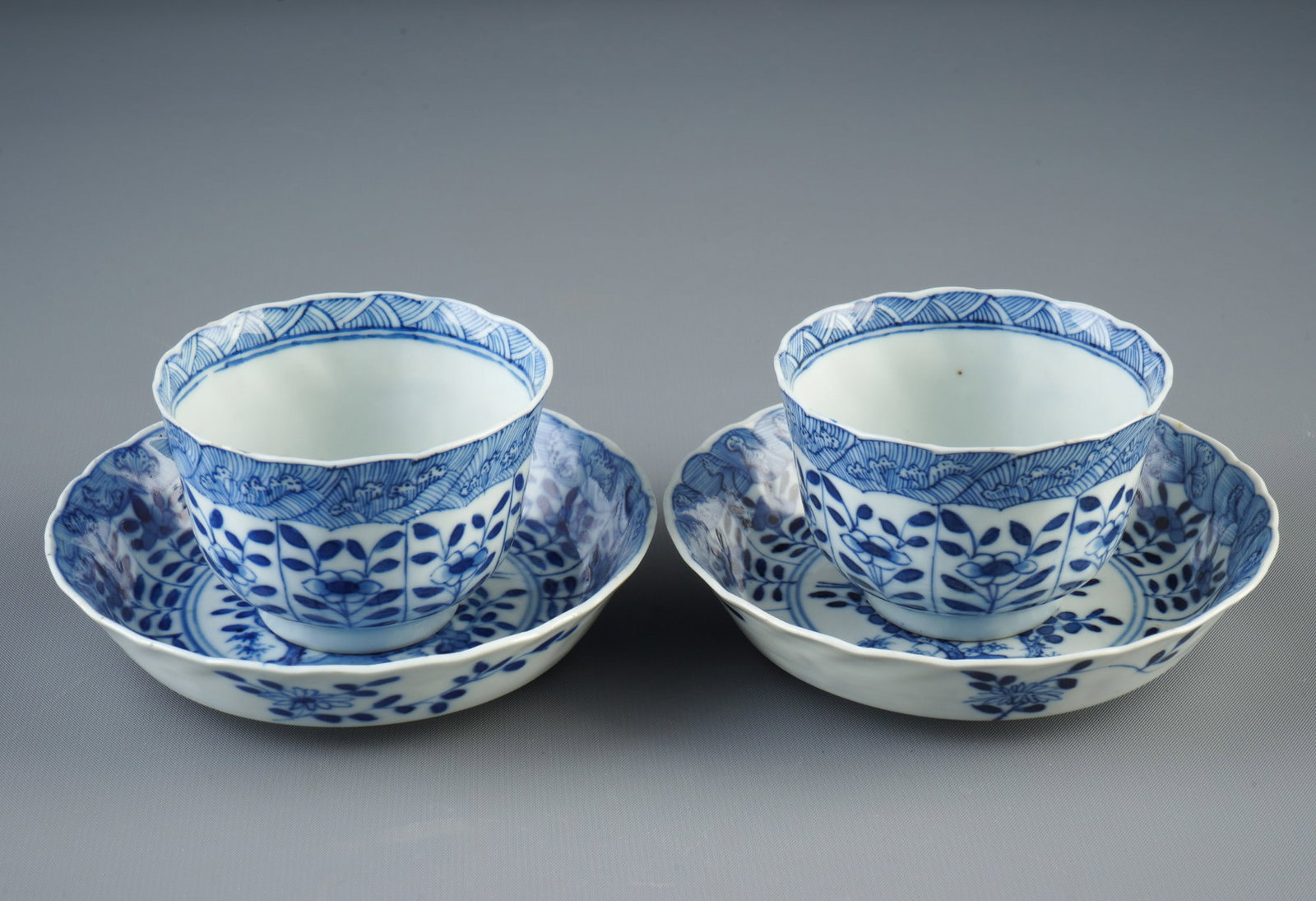 Two blue and white teacups with saucers, China, Qing Dynasty,: Porcelain, China, Qing Dynasty, two blue and white teacups with saucers, base with Xuande mark, cups H 5.3 cm × D 8 cm, saucers D 12.8 cm