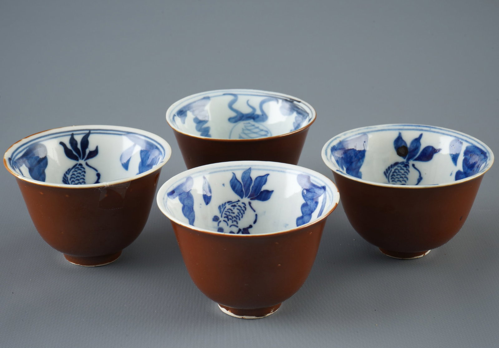 Four teacups with blue and white painting, China, (1 of 3)