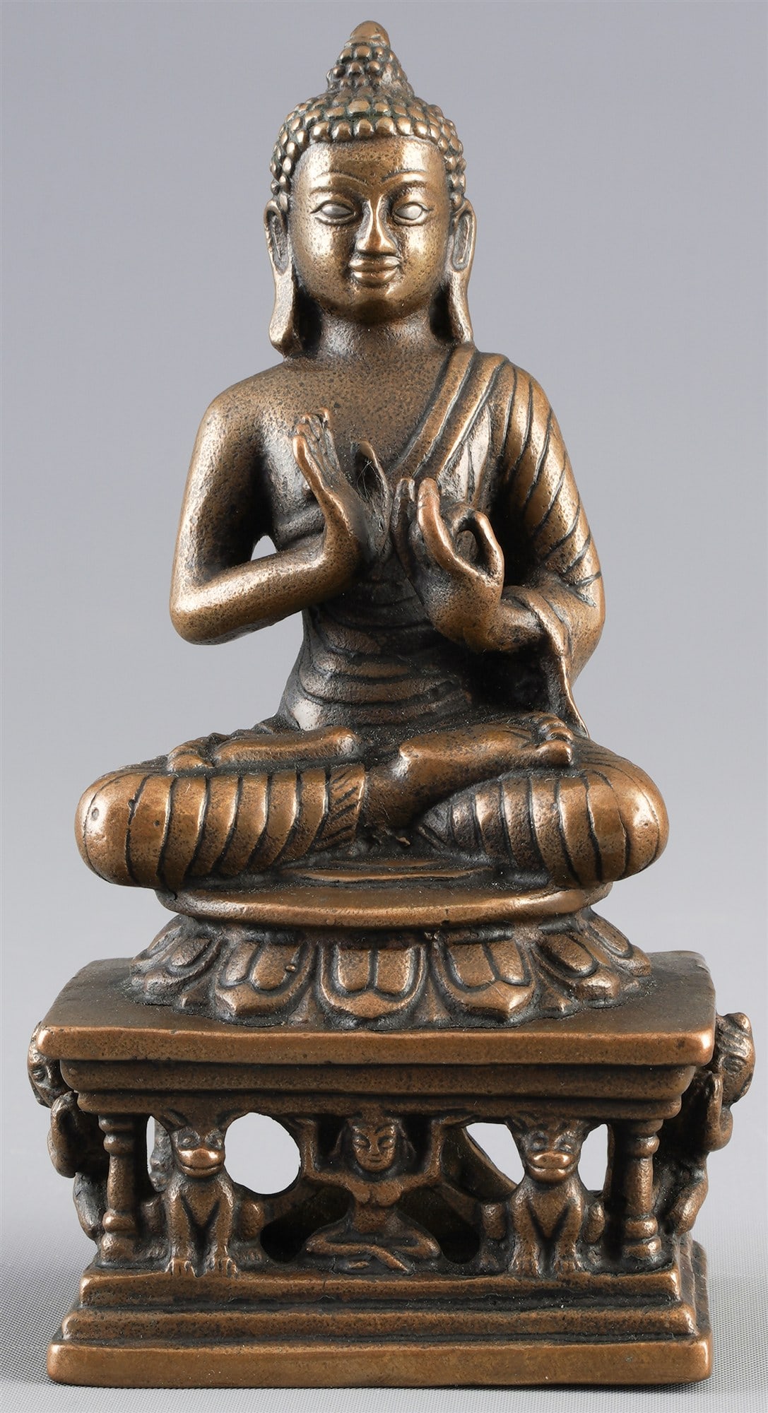 Bronze, seated Buddha with silver inlaid eyes, Tibet or Kashmir, 16th century (1 of 6)