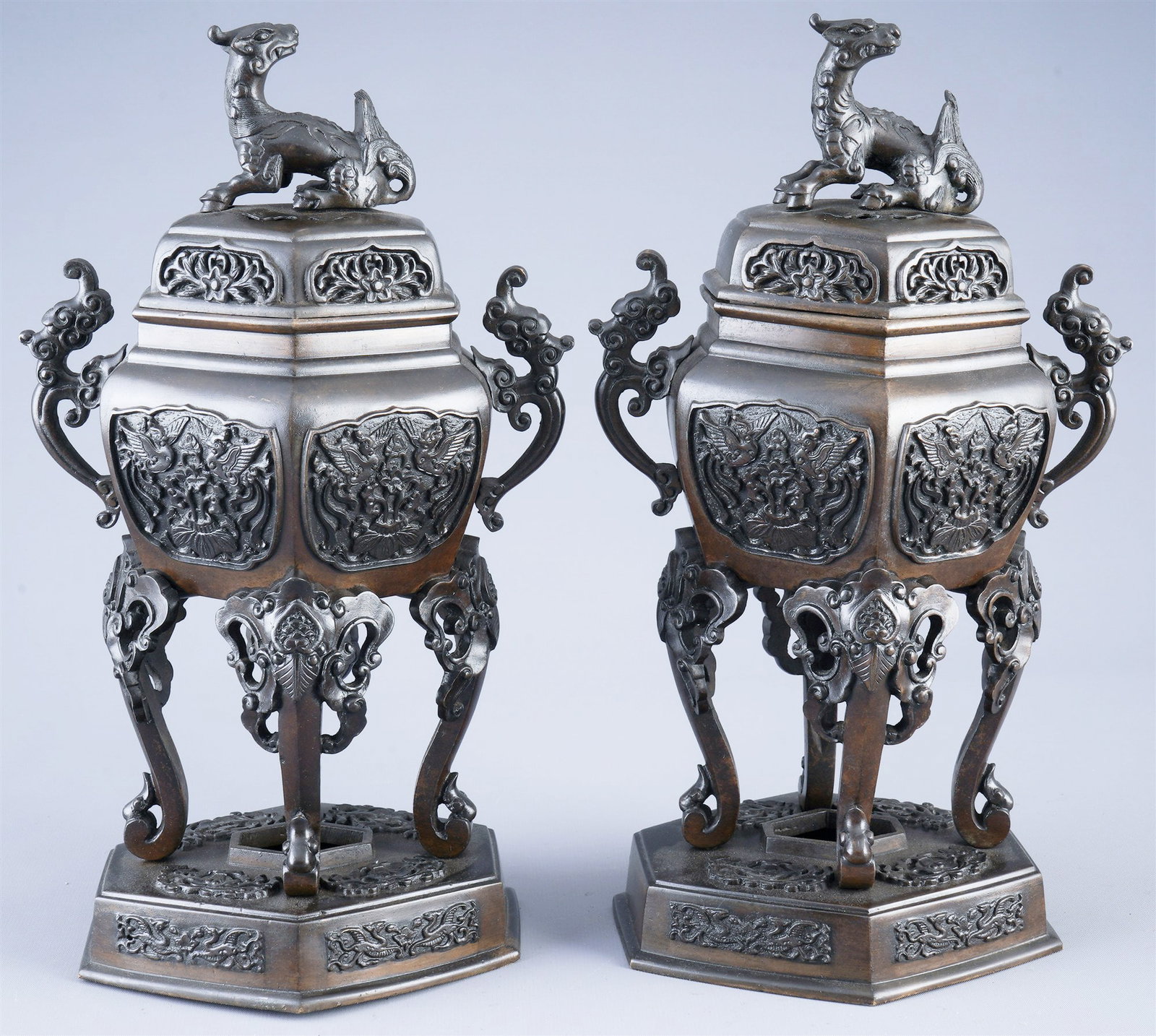 Pair of bronze incense burners, Japan Meiji period: Bronze, Japan Meiji period (1868–1912), pair of bronze incense burners, relief-like depictions of birds, floral elements and curved ornaments, 2 x H 32 cm x W 15 cm x D 13 cm