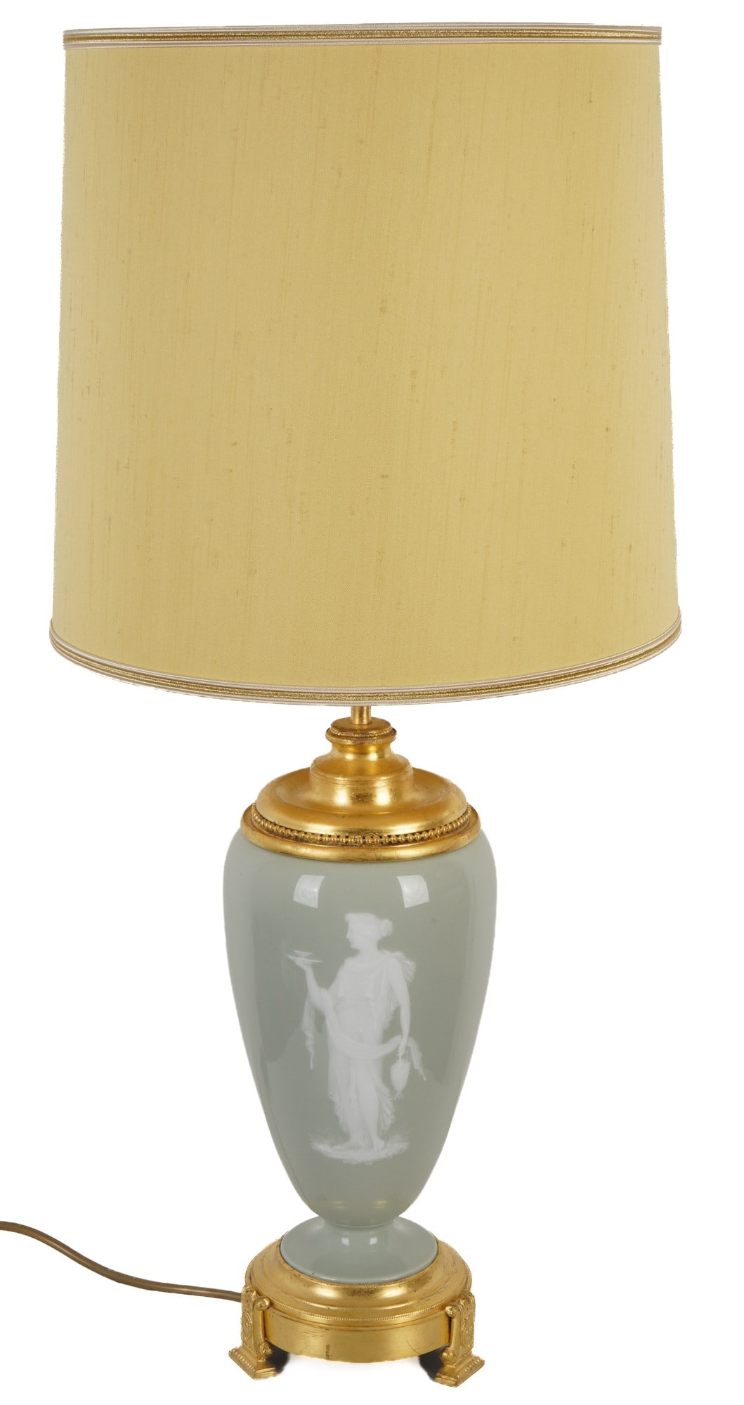 Table lamp with pate-sur-pate and bronze mount,: France, celadon green porcelain with a white pâte-sur-pâte relief of an antique-style female figure, rich neoclassical floral and tendril ornamentation on the reverse, gilt bronze/metal mount in the