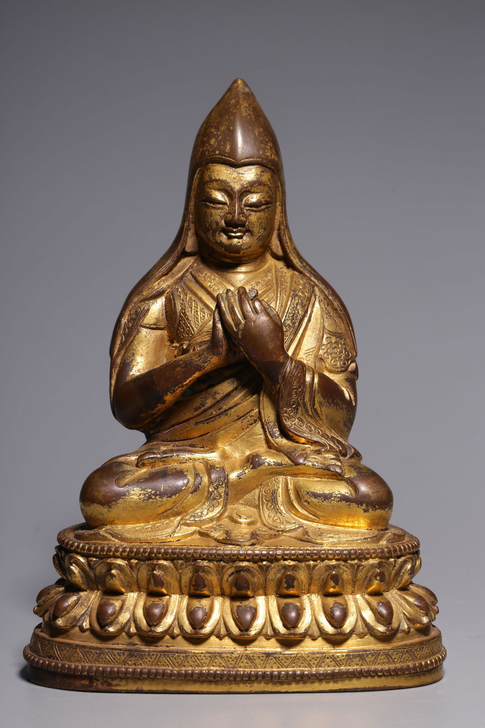In the Qing Dynasty, a bronze gilt statue of a seated master at Adi Gorge (1 of 9)