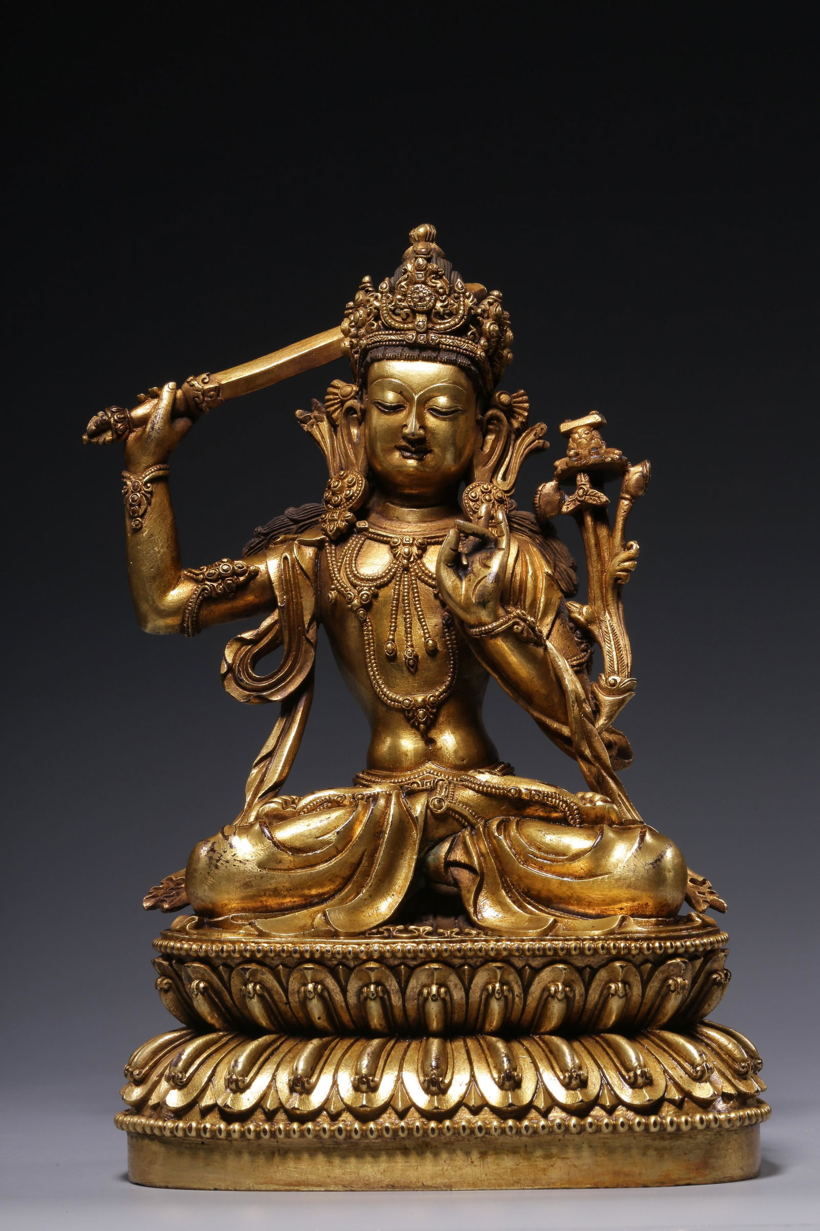 Sitting bronze gilt statue of Manjusri Bodhisattva in Qing Dynasty (1 of 9)