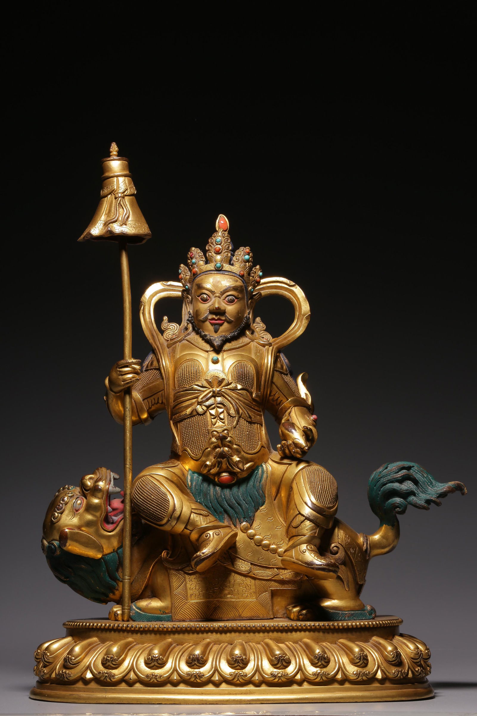 In the Qing Dynasty, a sitting statue of a gold-plated copper treasure king (1 of 9)