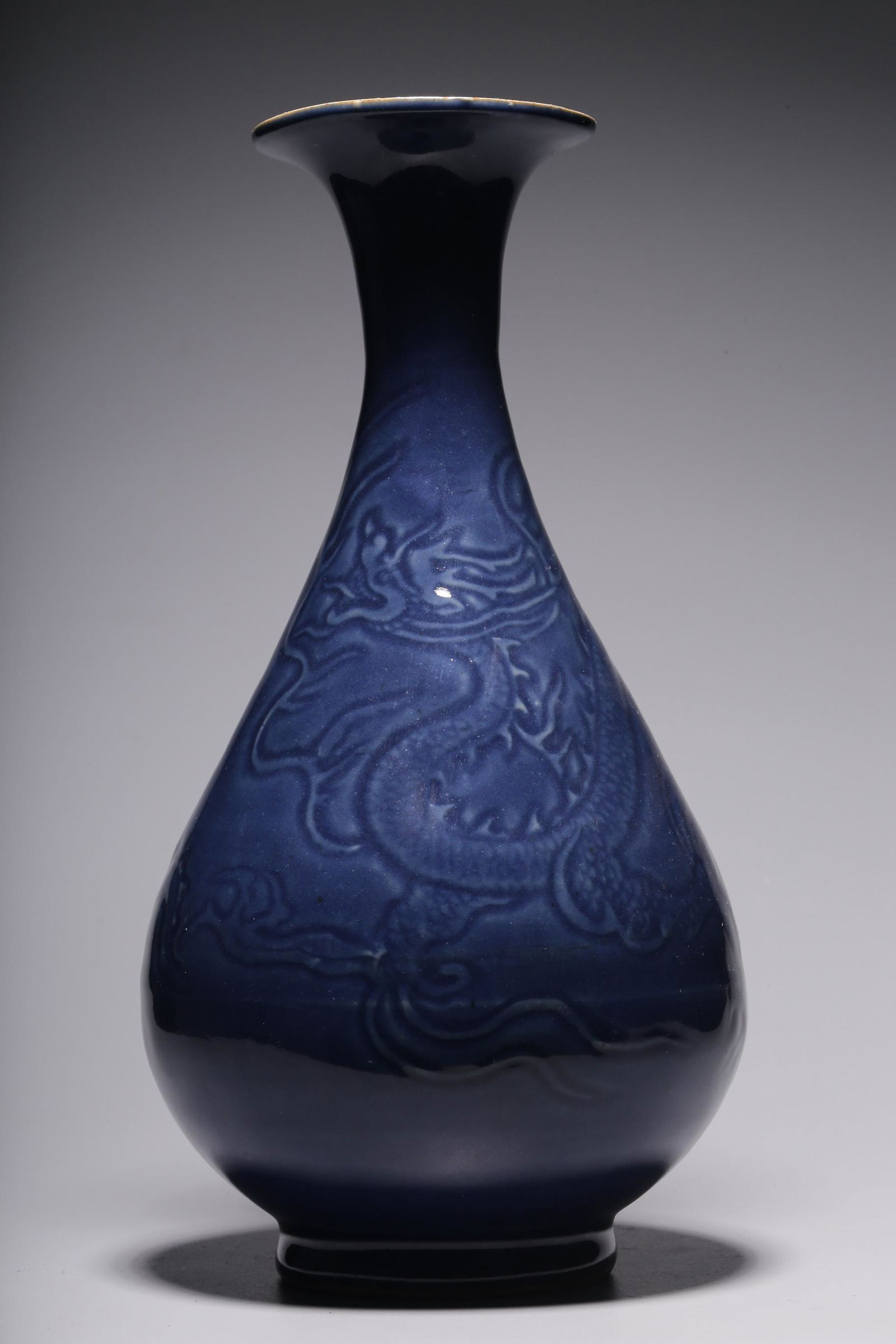 Blue glaze dark carved dragon pattern jade spring bottle (1 of 8)
