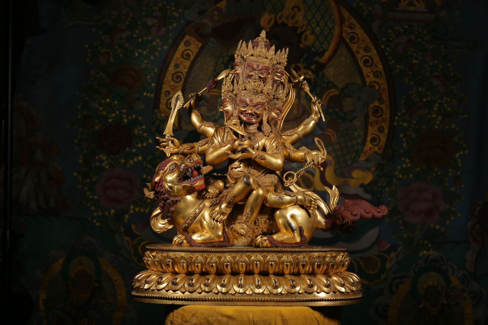 A bronze gilt statue of white Maha Gara with six arms from the Qing Dynasty (1 of 12)