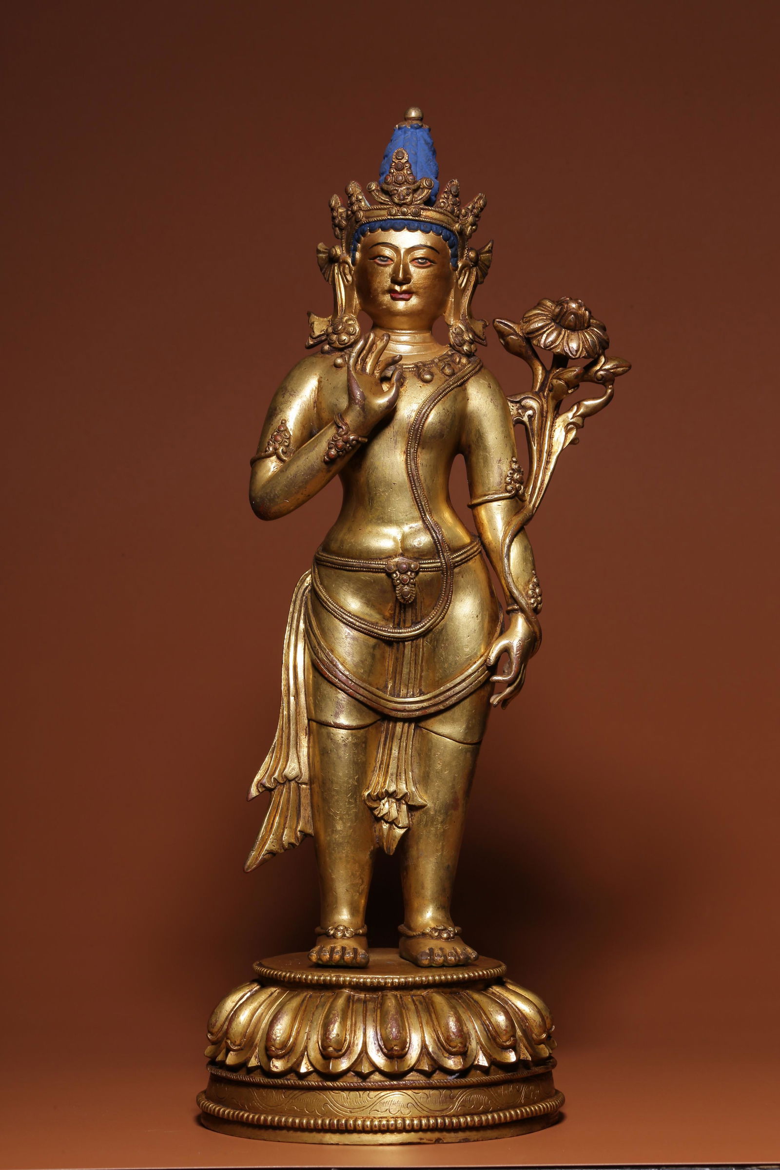 Bronze gilt statue of Guanyin holding lotus in Qing Dynasty (1 of 8)